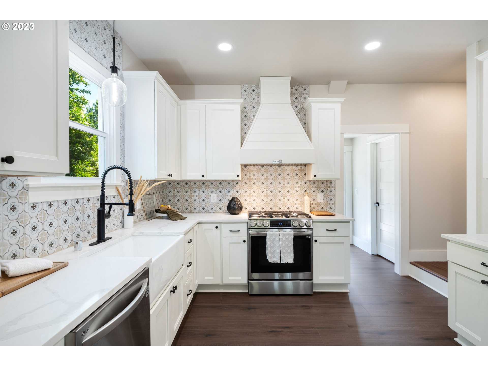 914 Northwest 7th Avenue Camas, WA 98607 - Photo 9 of 26 a kitchen with a sink cabinets and window