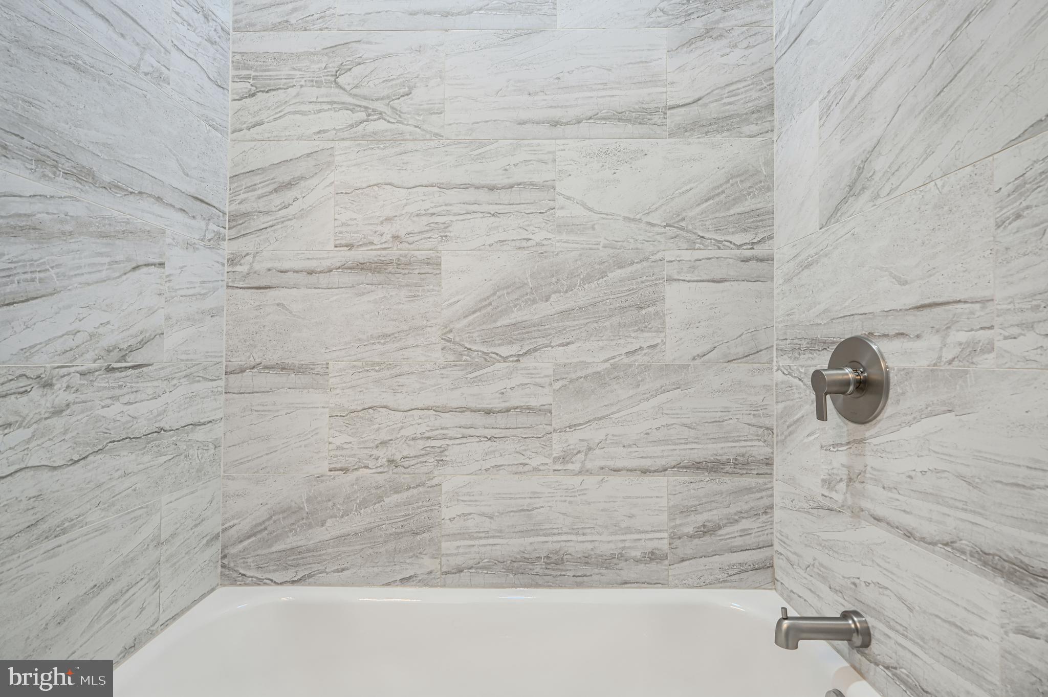 615 Linnard Street Baltimore, MD 21229 - Photo 14 of 28 a bathroom with a shower