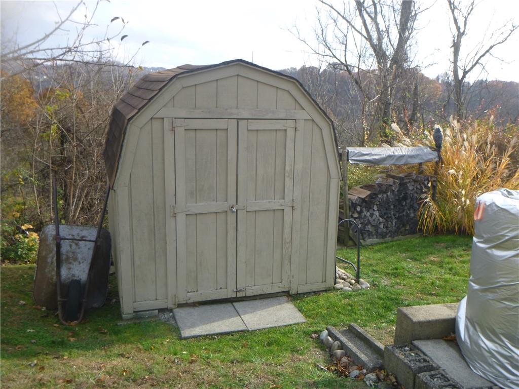133 Pinto Drive, Unit PINTO DRIVE Plum, PA 15239 - Photo 14 of 21 a view of a back yard of the house