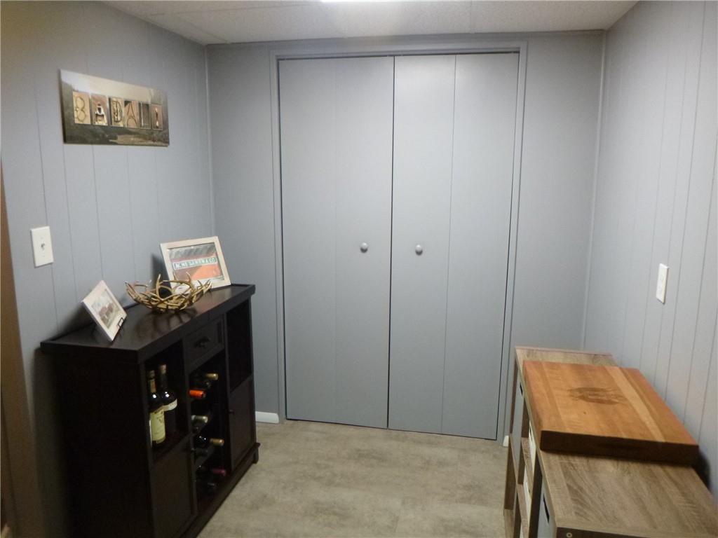 133 Pinto Drive, Unit PINTO DRIVE Plum, PA 15239 - Photo 19 of 21 a room with a mirror