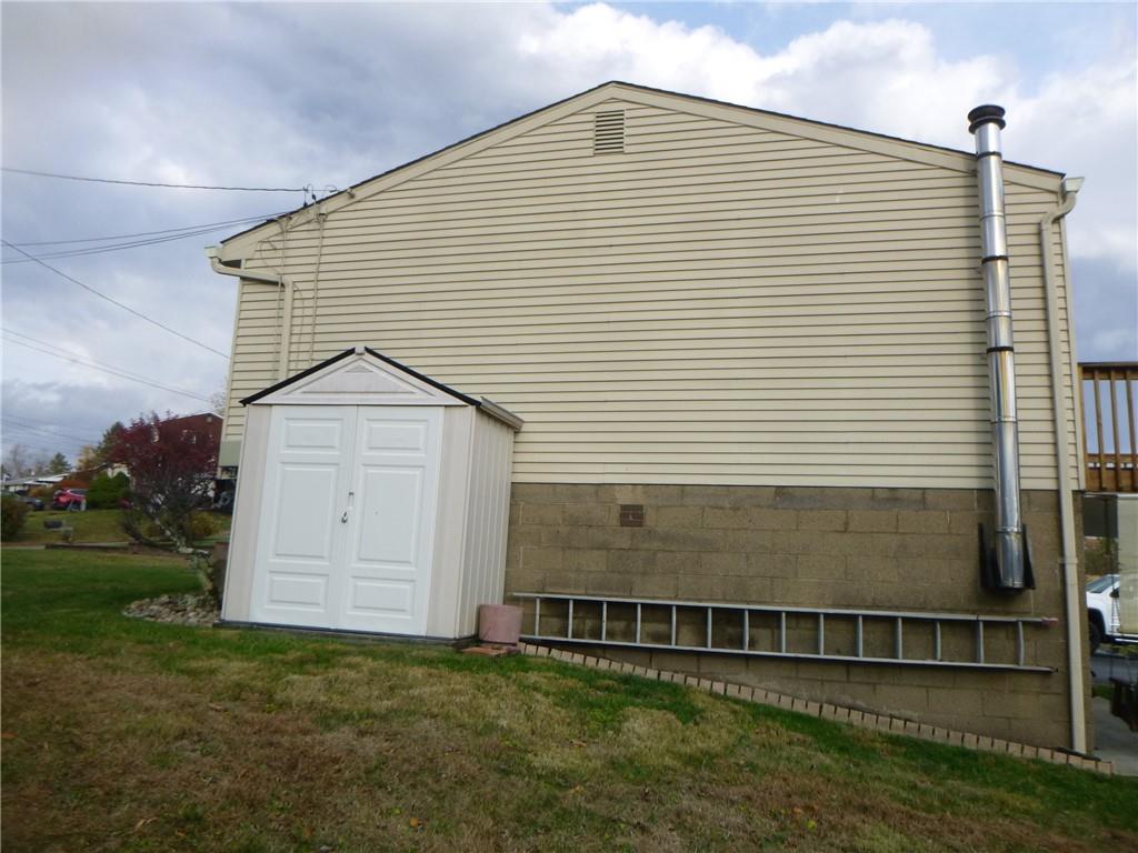133 Pinto Drive, Unit PINTO DRIVE Plum, PA 15239 - Photo 4 of 21 a front view of a house with a yard