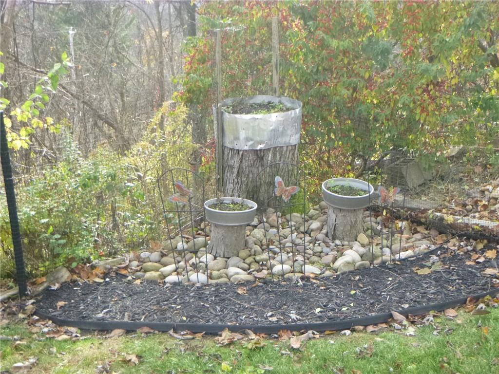 133 Pinto Drive, Unit PINTO DRIVE Plum, PA 15239 - Photo 5 of 21 a view of a bathroom with a toilet shower and a sink