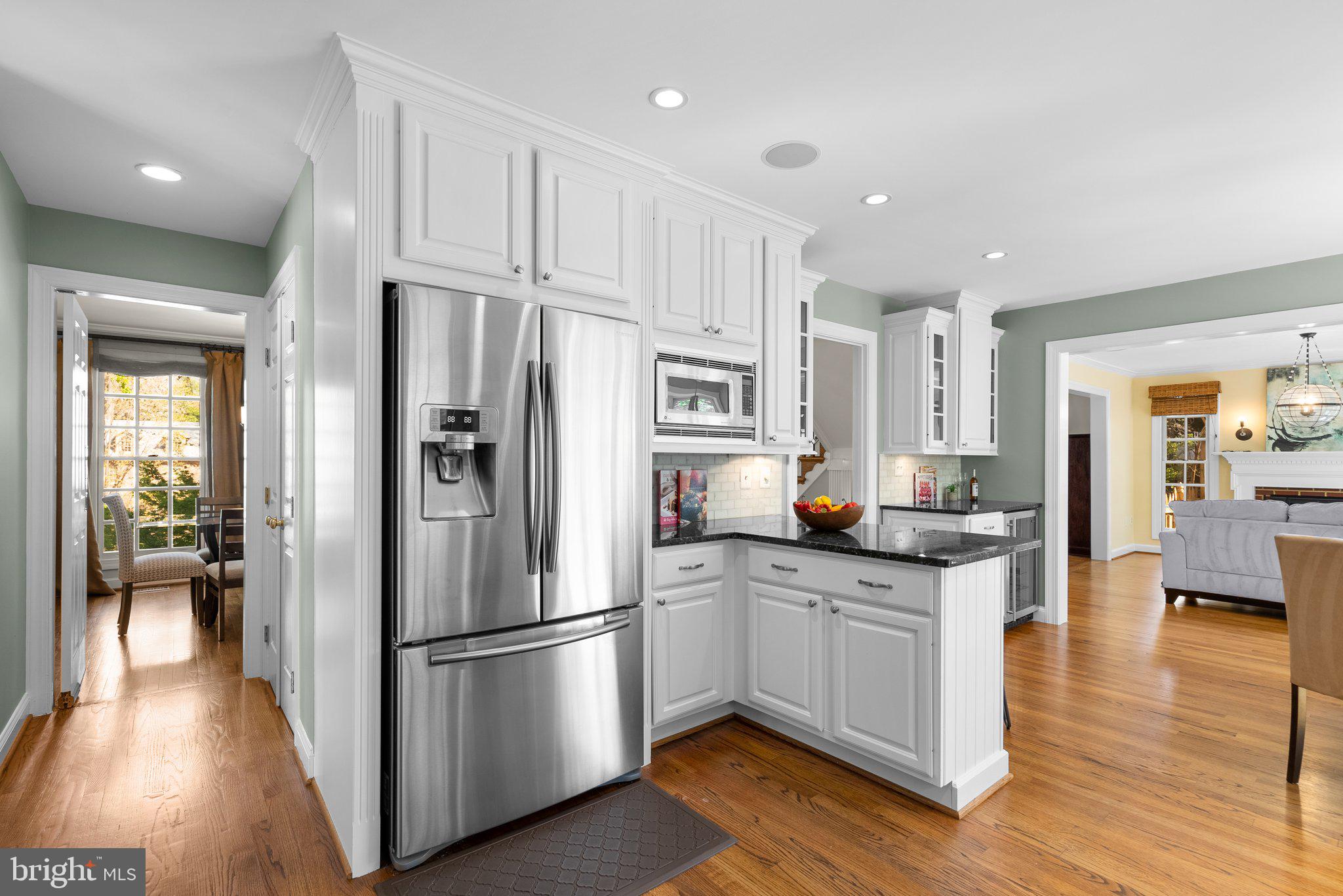 3106 Russell Road Alexandria, VA 22305 - Photo 16 of 62 a kitchen with stainless steel appliances a refrigerator sink and cabinets