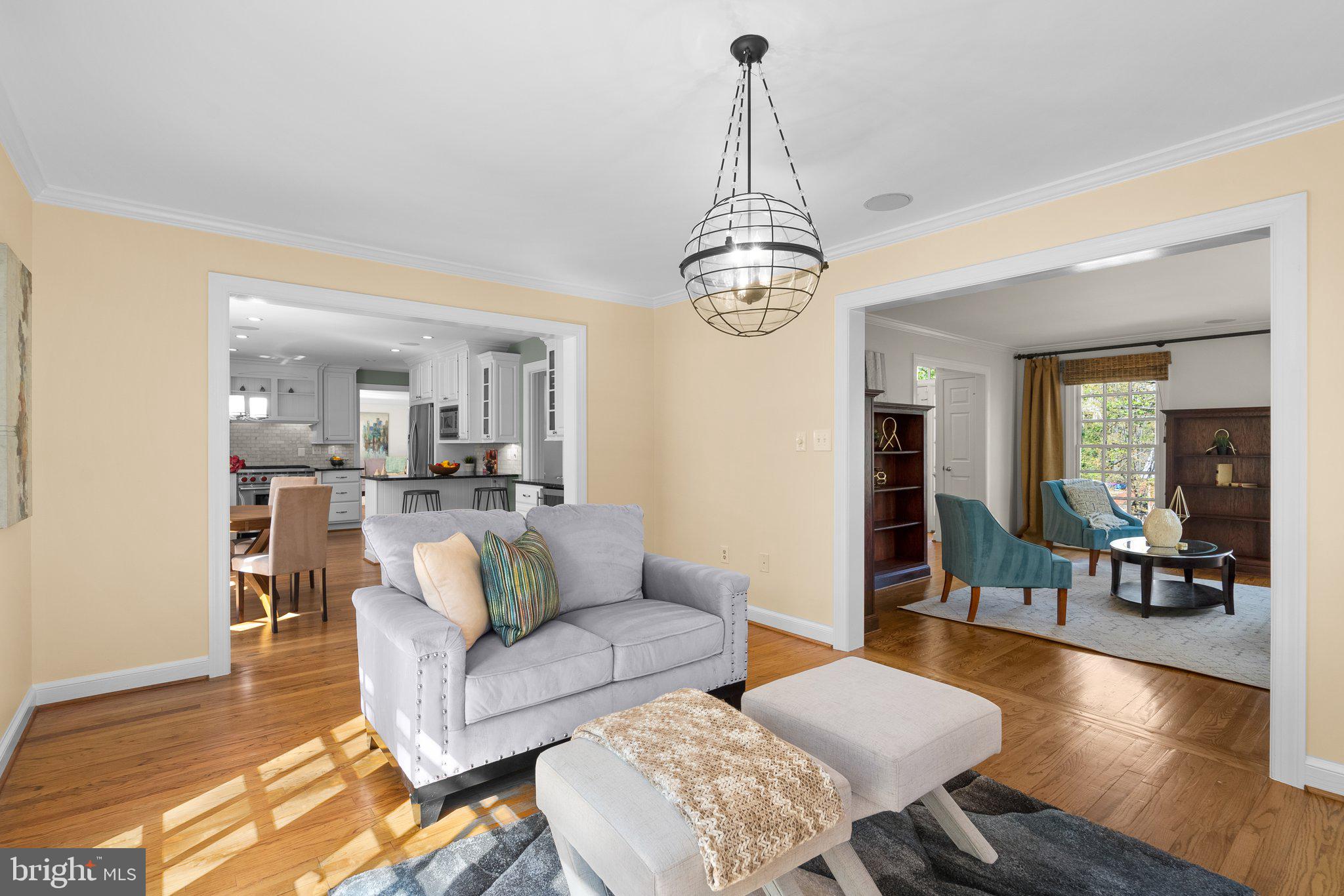 3106 Russell Road Alexandria, VA 22305 - Photo 21 of 62 a living room with furniture chandelier and a view of living room