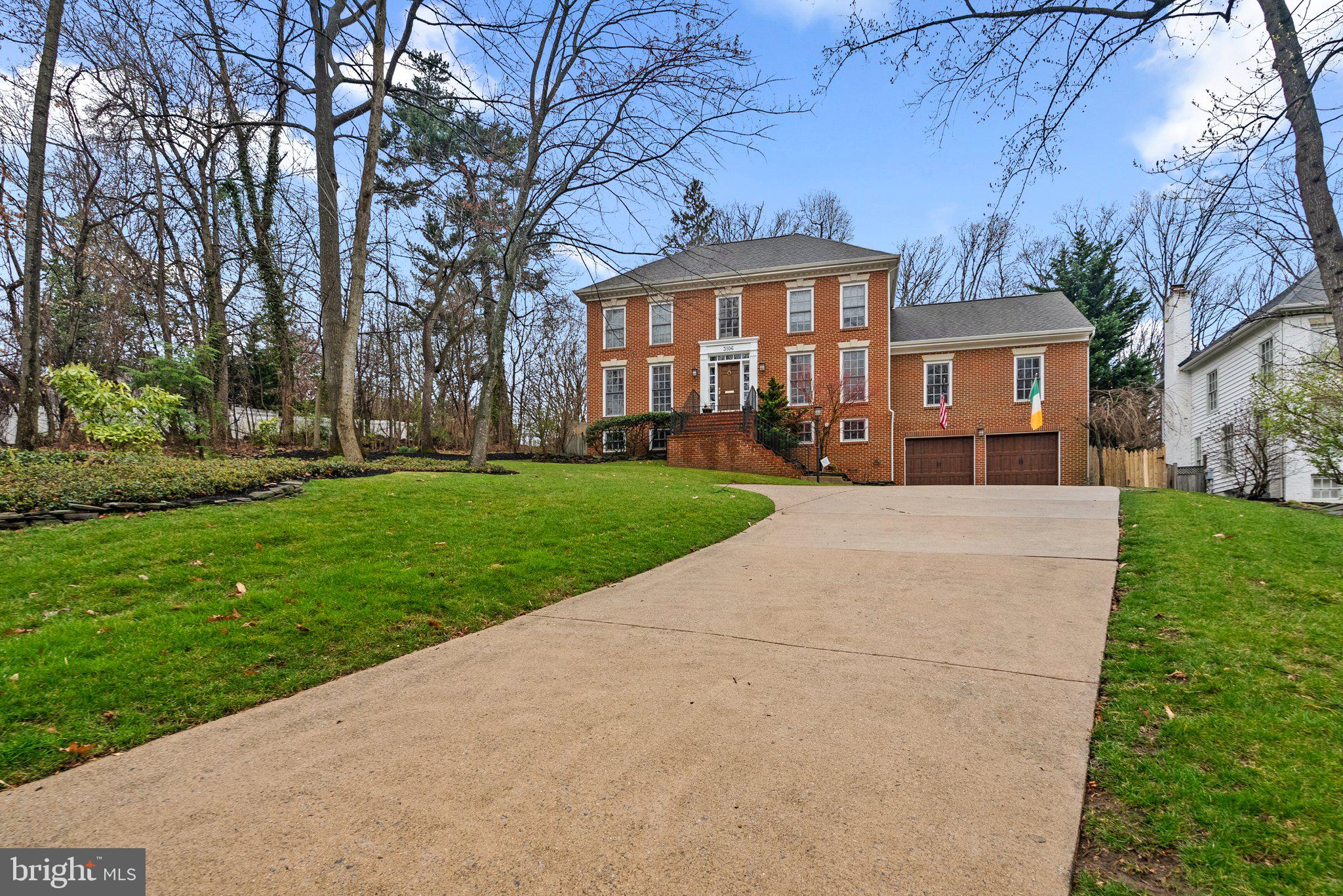 3106 Russell Road Alexandria, VA 22305 - Photo 3 of 62 front view of a house with a yard