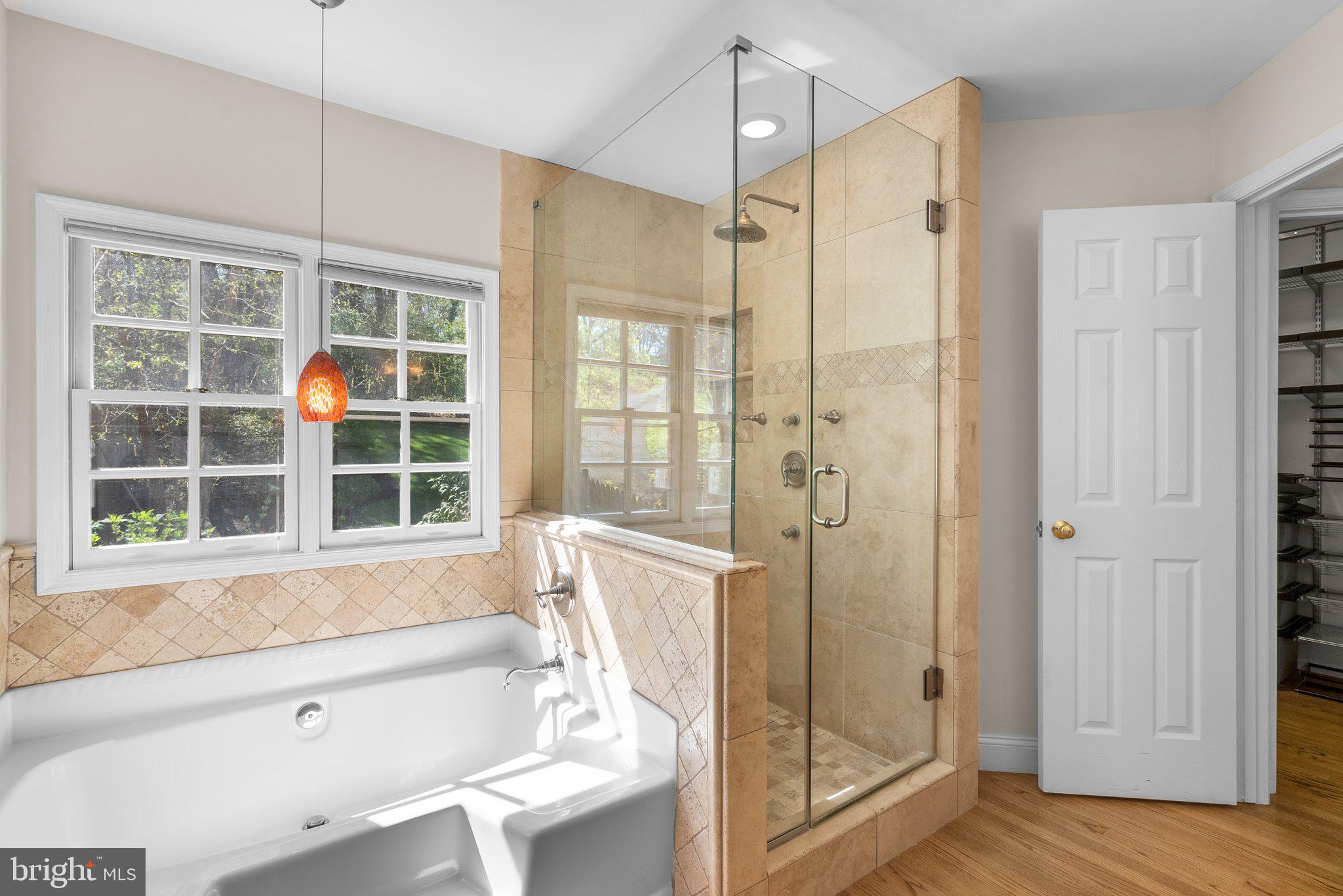 3106 Russell Road Alexandria, VA 22305 - Photo 33 of 62 a bathroom with a bathtub and a shower