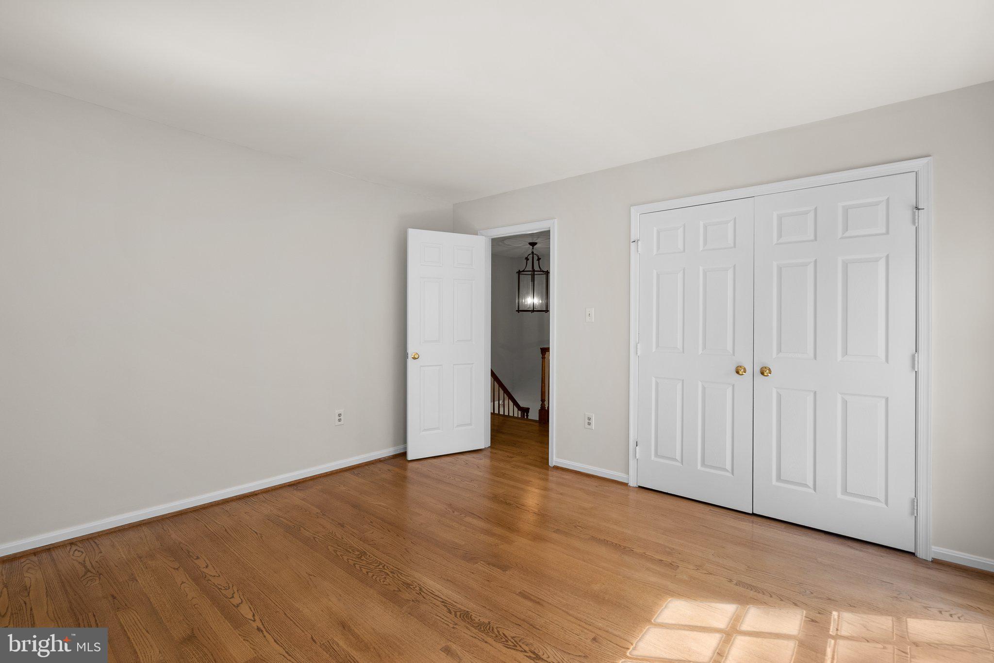 3106 Russell Road Alexandria, VA 22305 - Photo 35 of 62 a view of an empty room with wooden floor