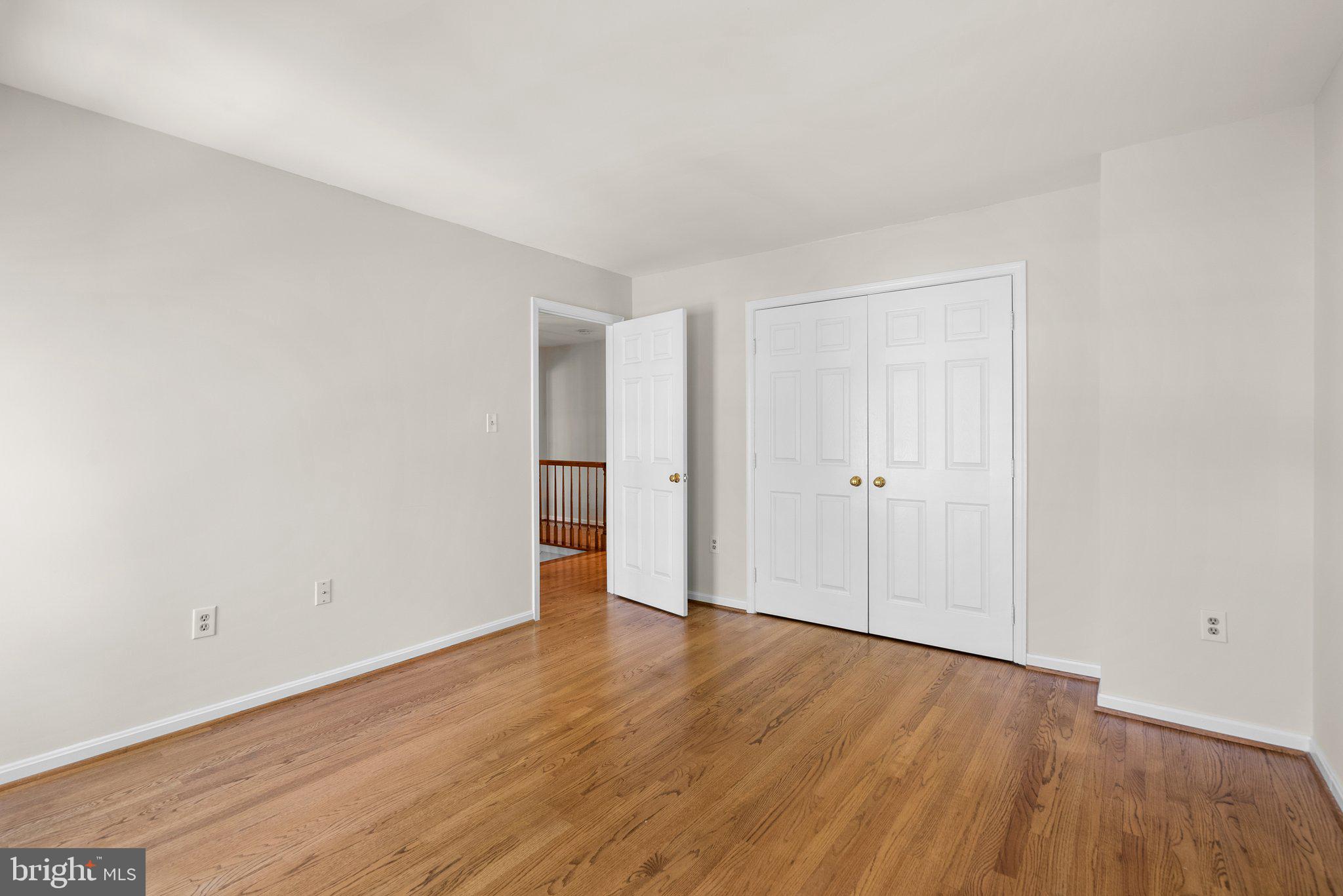 3106 Russell Road Alexandria, VA 22305 - Photo 37 of 62 a view of an empty room with wooden floor