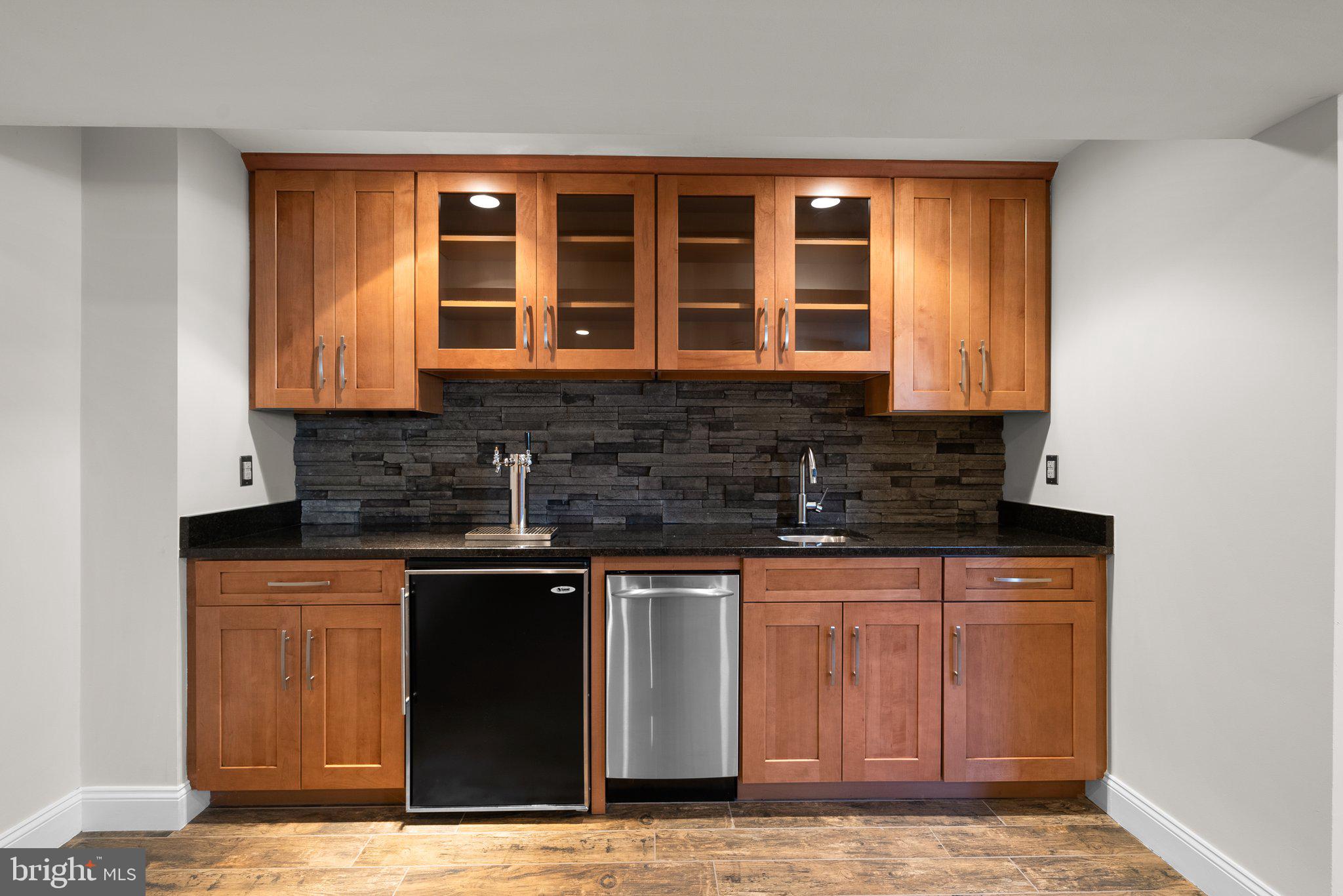 3106 Russell Road Alexandria, VA 22305 - Photo 44 of 62 a kitchen with stainless steel appliances granite countertop a stove and a sink
