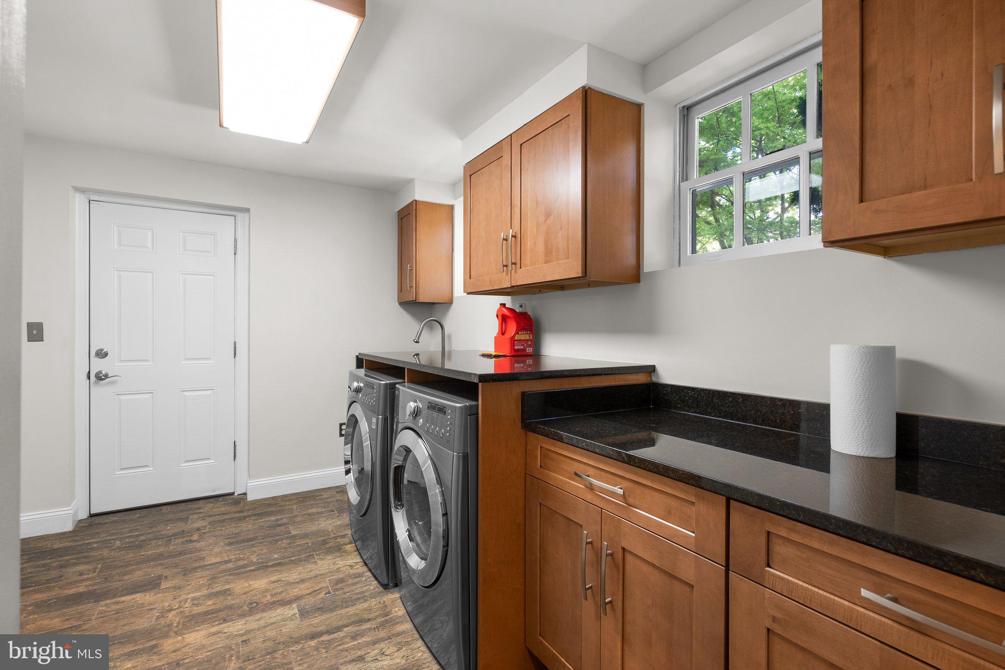 3106 Russell Road Alexandria, VA 22305 - Photo 52 of 62 a kitchen with a refrigerator and a sink