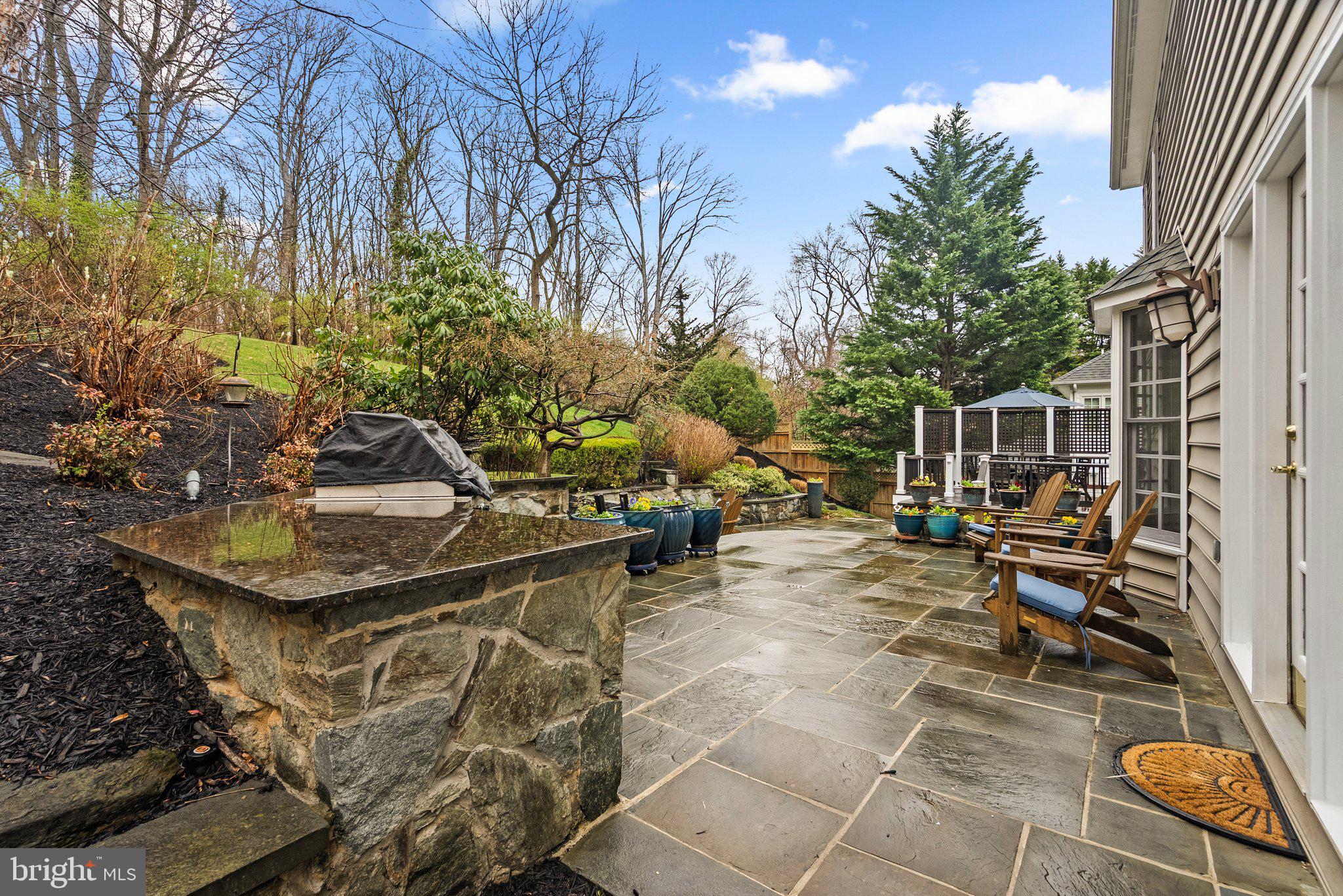 3106 Russell Road Alexandria, VA 22305 - Photo 54 of 62 a view of a patio with table and chairs and potted plants