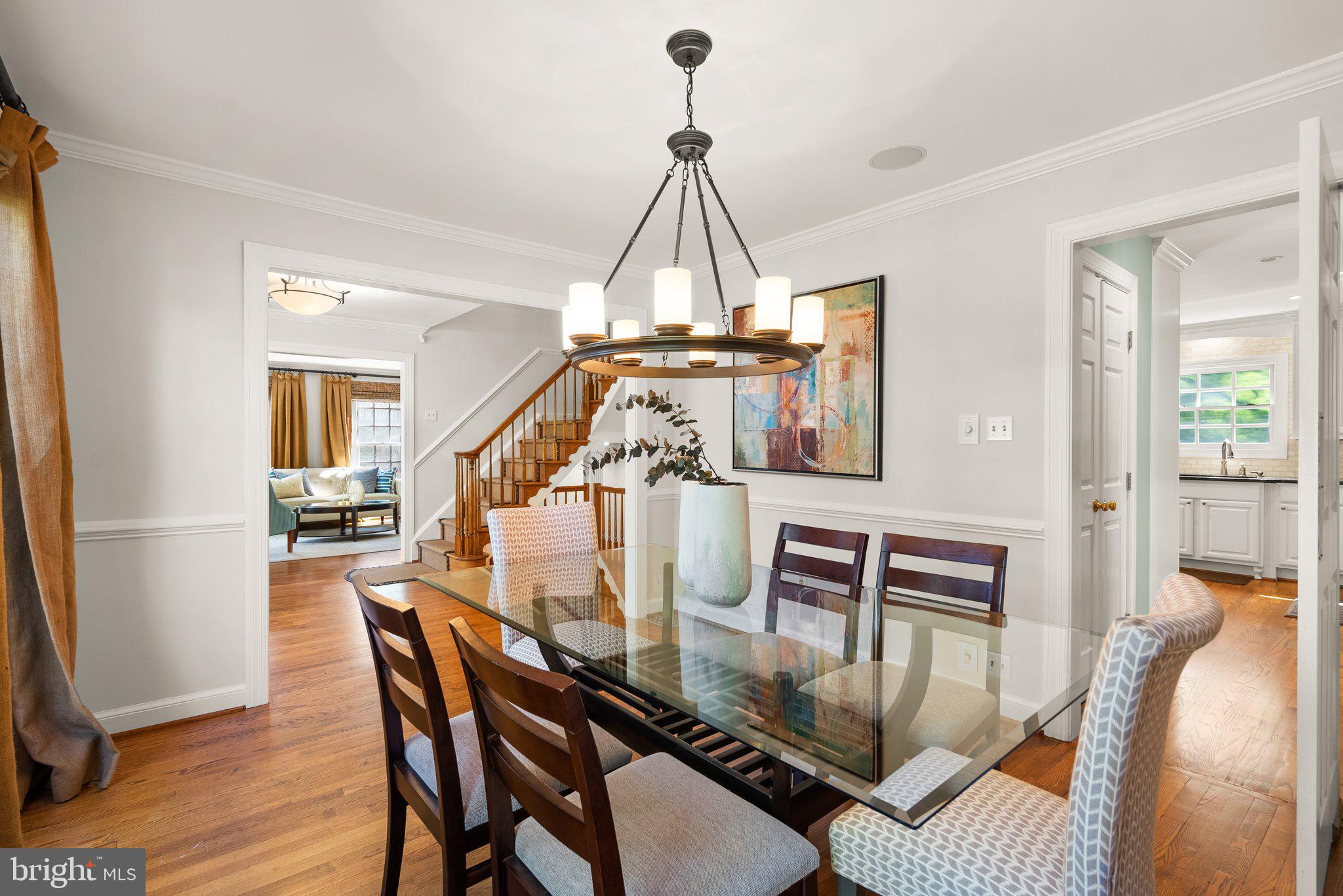 3106 Russell Road Alexandria, VA 22305 - Photo 10 of 62 a view of a dining room with furniture and wooden floor