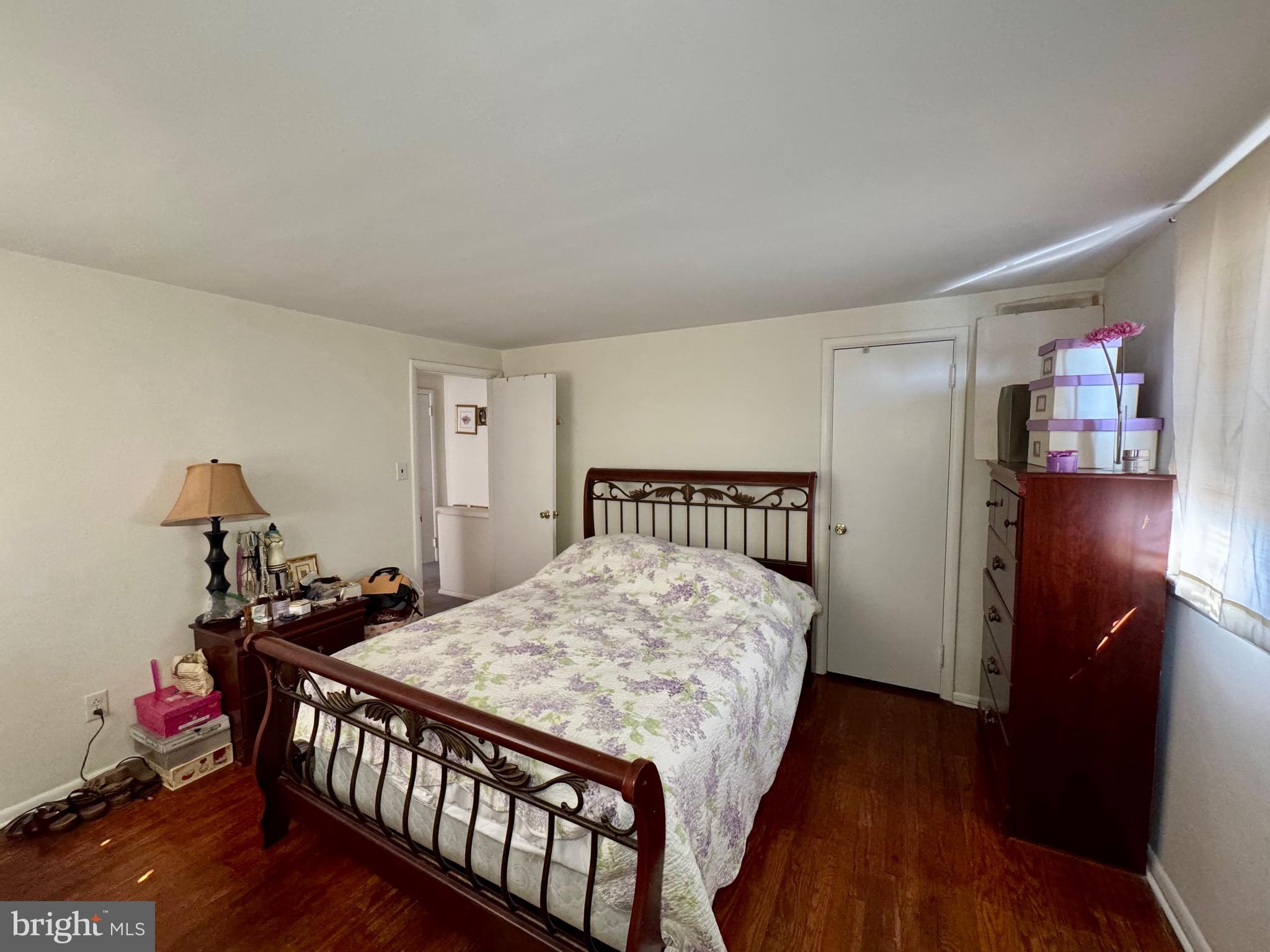 236 Willard Drive Ridley Park, PA 19078 - Photo 12 of 19 a bedroom with a bed and wooden floor