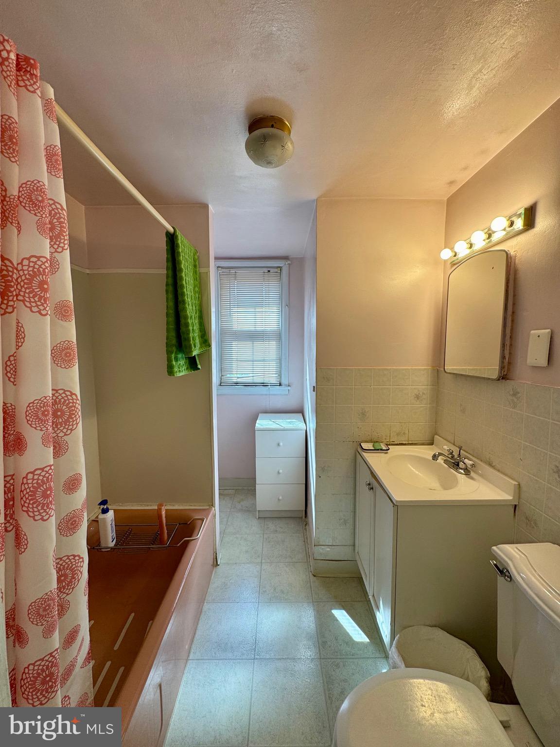236 Willard Drive Ridley Park, PA 19078 - Photo 17 of 19 a bathroom with a toilet sink and mirror