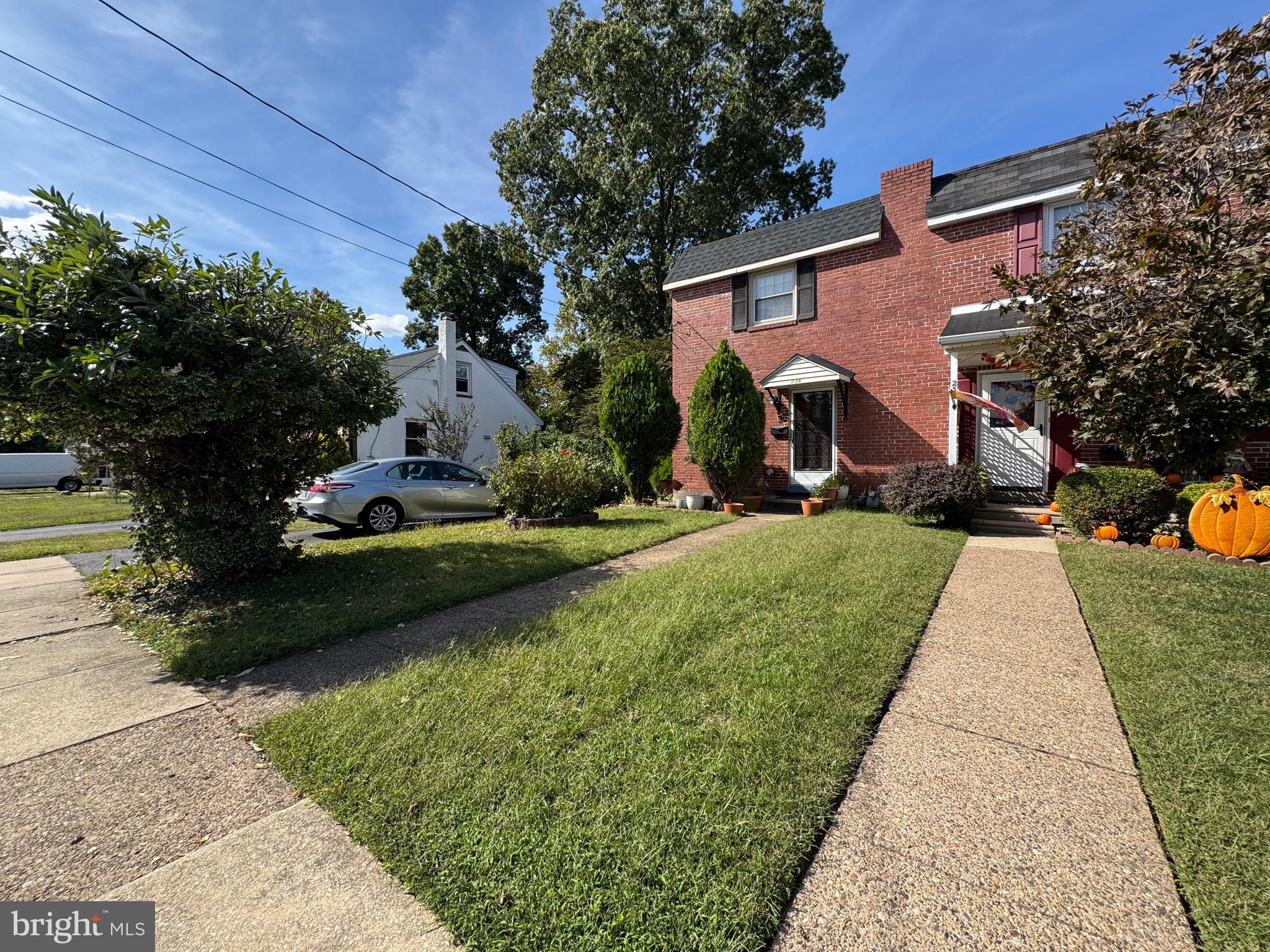 236 Willard Drive Ridley Park, PA 19078 - Photo 3 of 19 a front view of a house with a yard