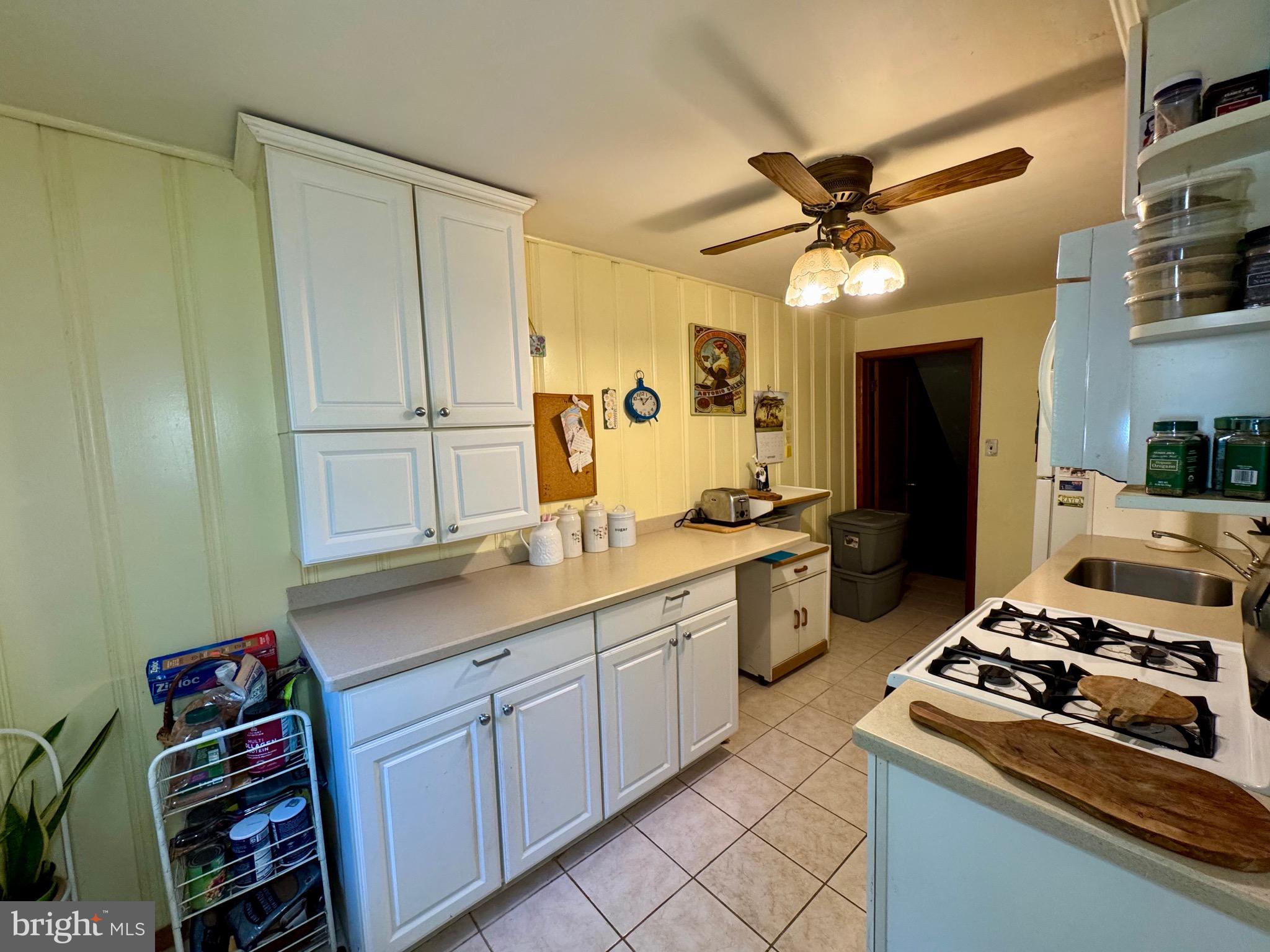 236 Willard Drive Ridley Park, PA 19078 - Photo 8 of 19 a kitchen with a stove cabinets and a sink
