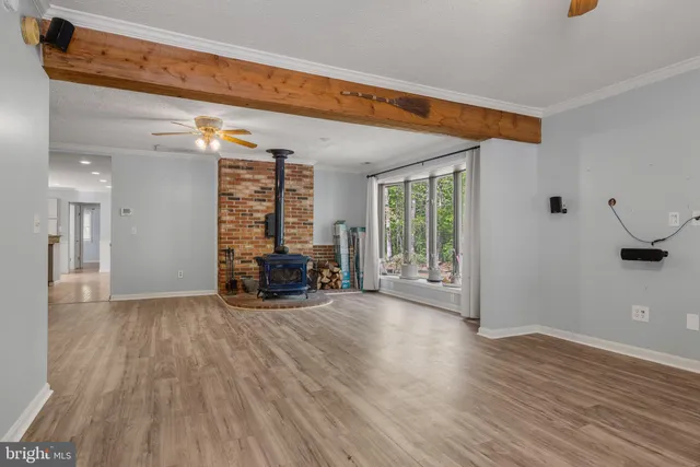 a view of a room with large windows