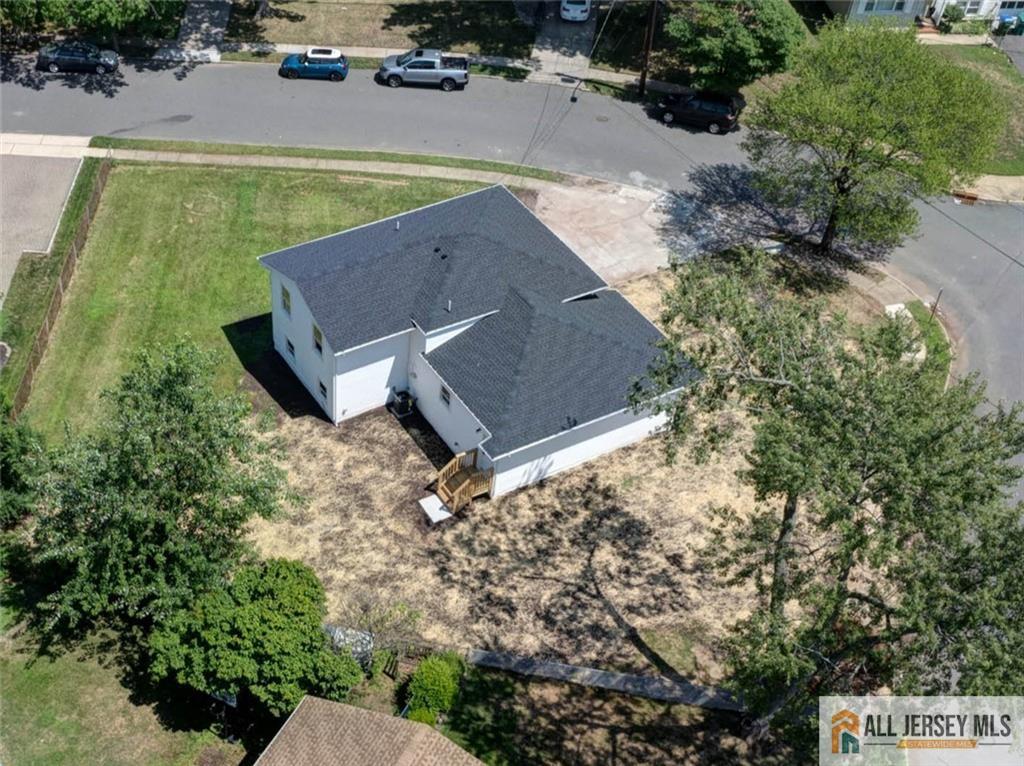 42 Larchmont Road Edison, NJ 08837 - Photo 31 of 36 an aerial view of a house with yard swimming pool and outdoor seating