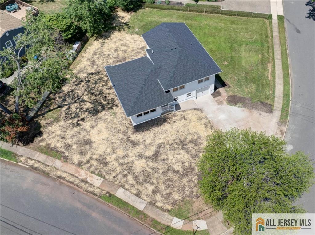 42 Larchmont Road Edison, NJ 08837 - Photo 4 of 36 an aerial view of a house with a yard