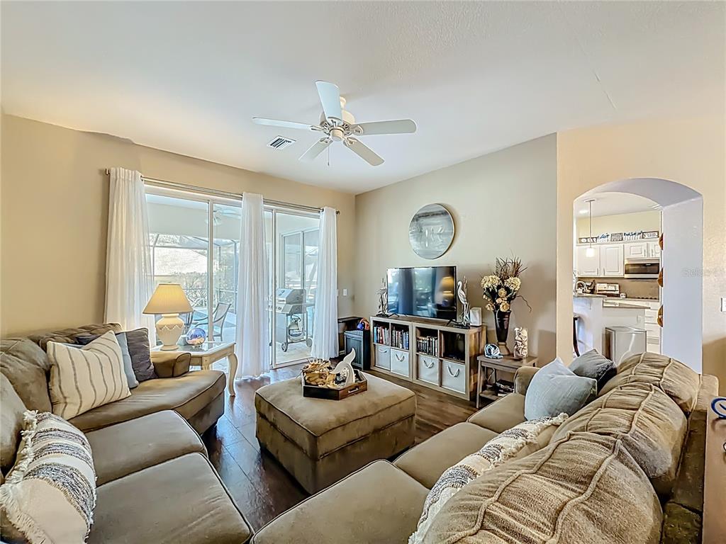 9027 Southwest 196th Court Dunnellon, FL 34432 - Photo 14 of 50 a living room with furniture and a large window