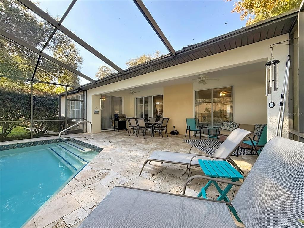 9027 Southwest 196th Court Dunnellon, FL 34432 - Photo 41 of 50 a view of swimming pool with outdoor seating and a outdoor space