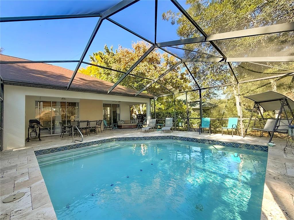 9027 Southwest 196th Court Dunnellon, FL 34432 - Photo 43 of 50 a view of a house with sitting area and a small yard