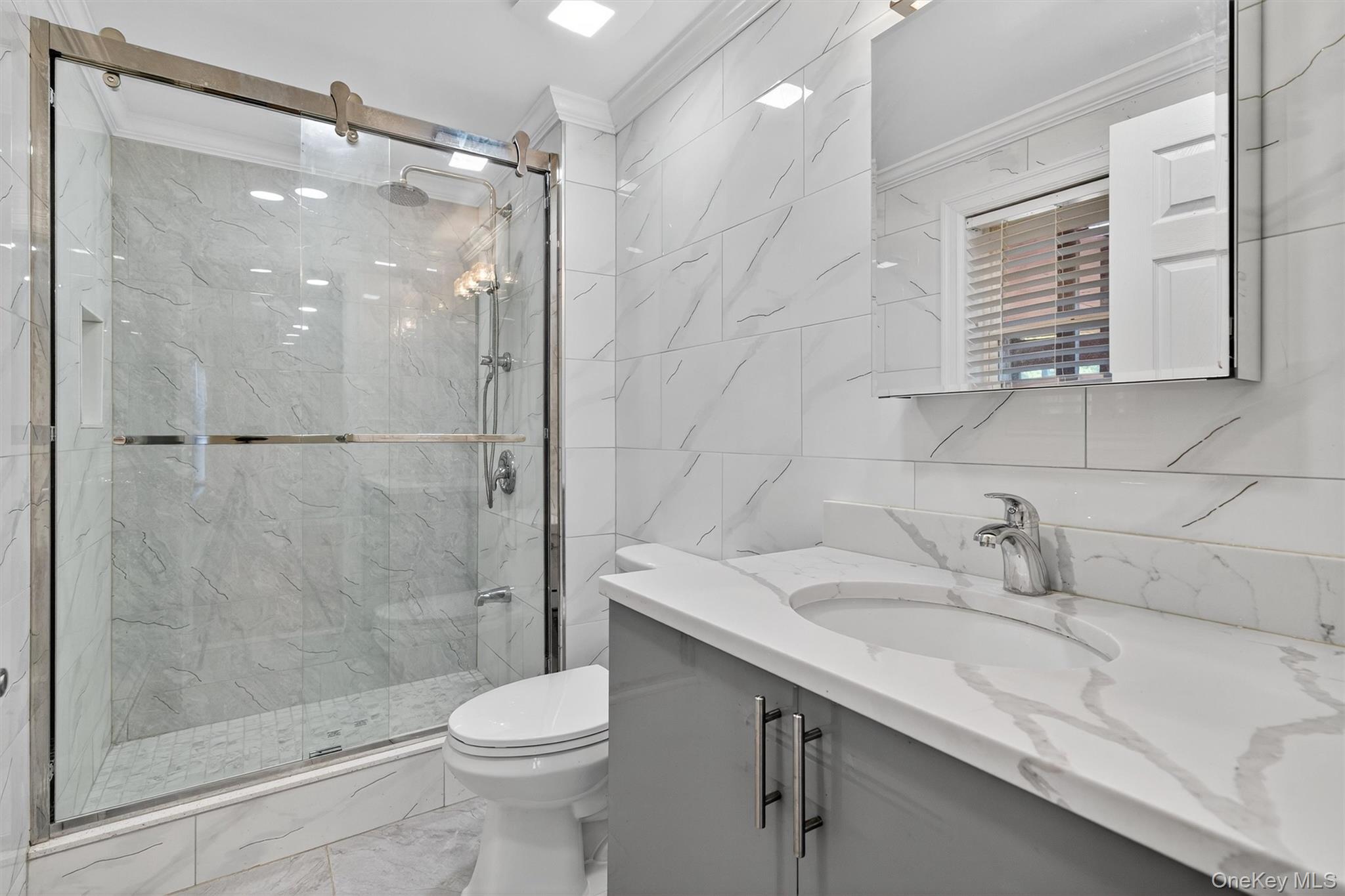 229 Gardnerville Road New Hampton, NY 10958 - Photo 25 of 50 a bathroom with a sink toilet and shower