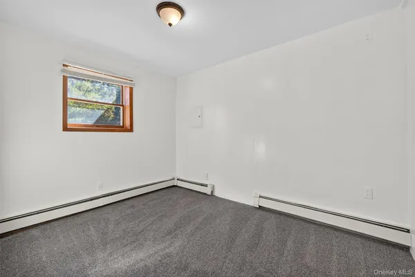 an empty room with a workbench