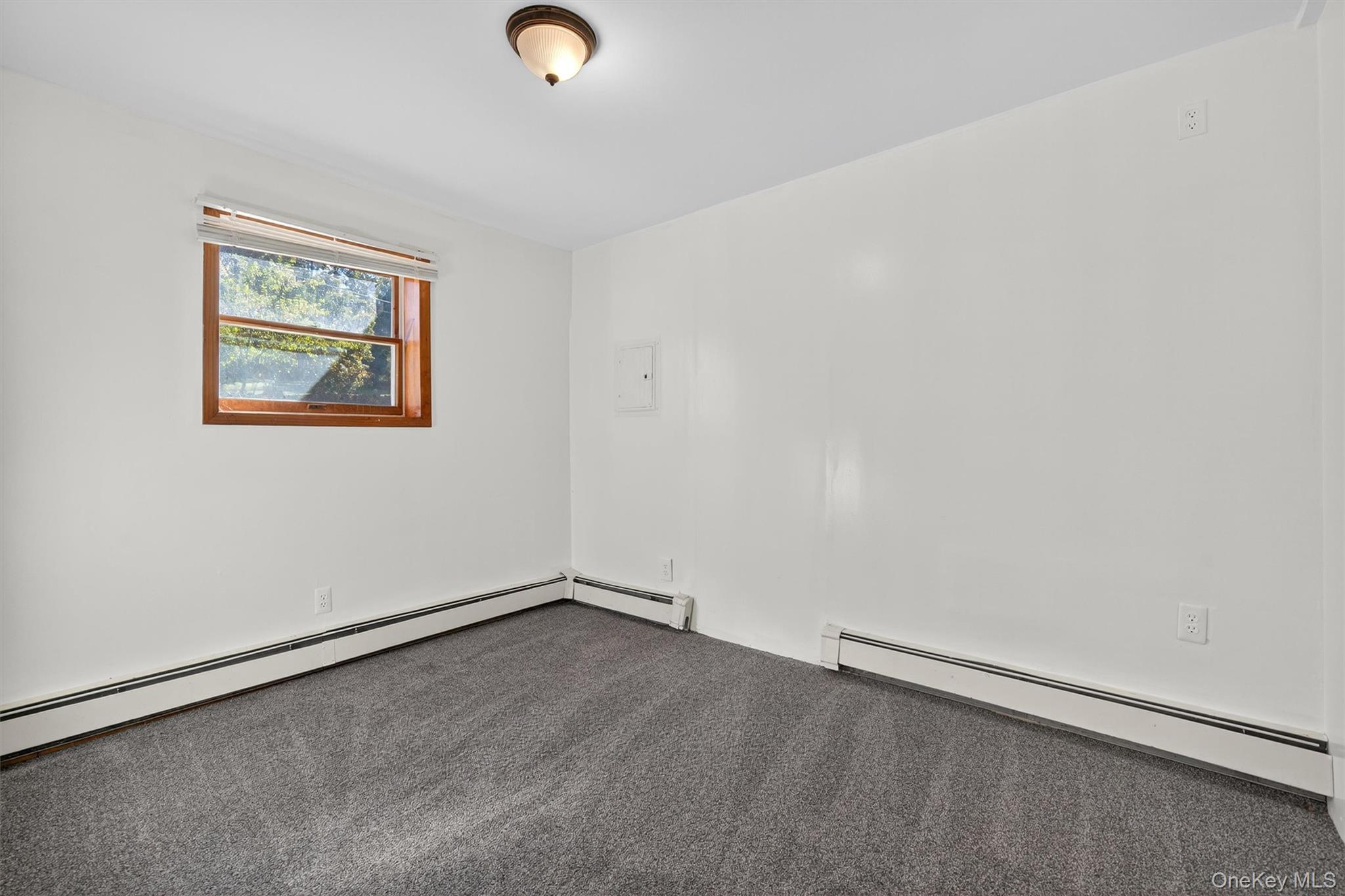 229 Gardnerville Road New Hampton, NY 10958 - Photo 35 of 50 an empty room with a workbench