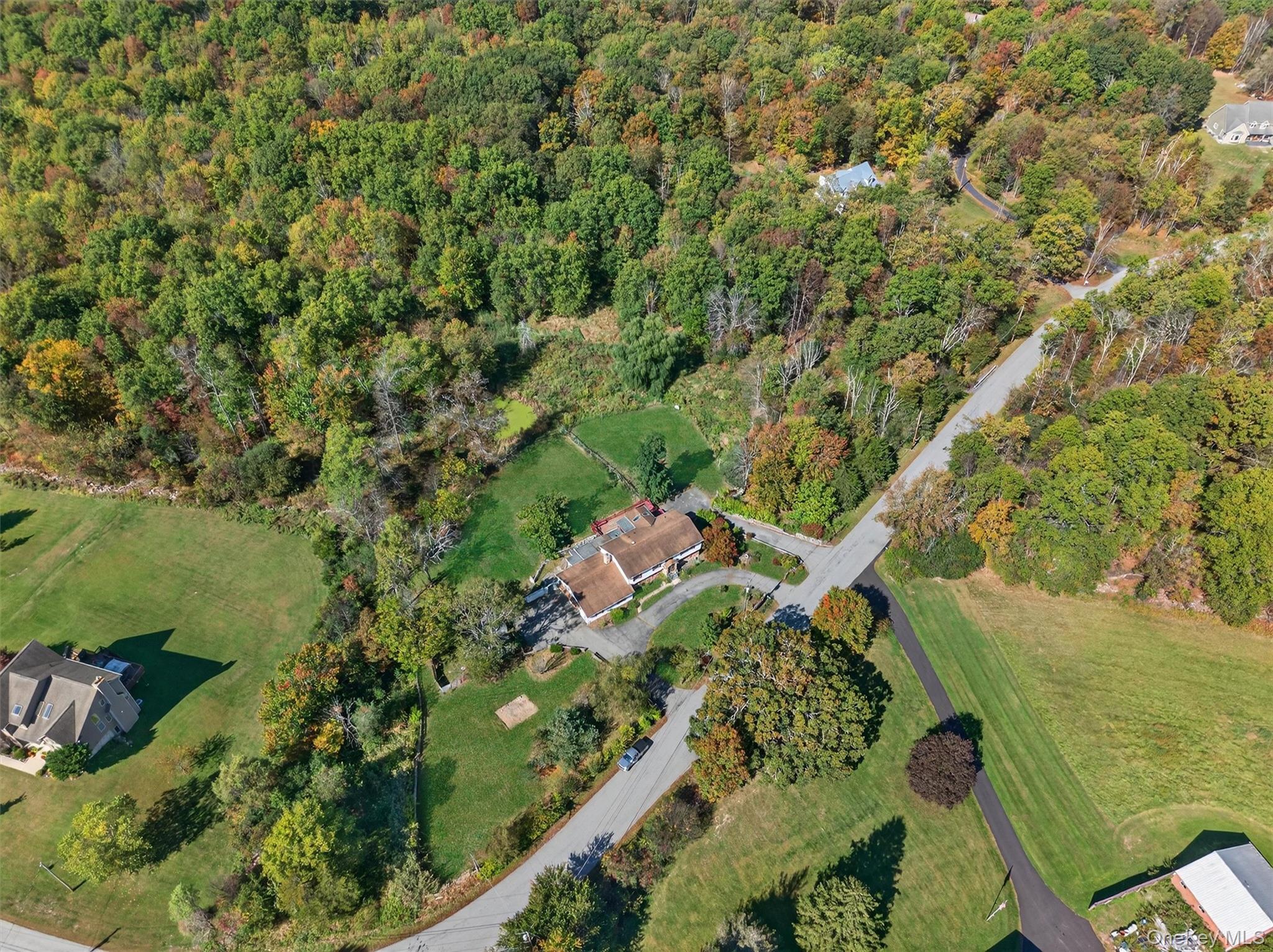 229 Gardnerville Road New Hampton, NY 10958 - Photo 7 of 50 an aerial view of a house with a yard