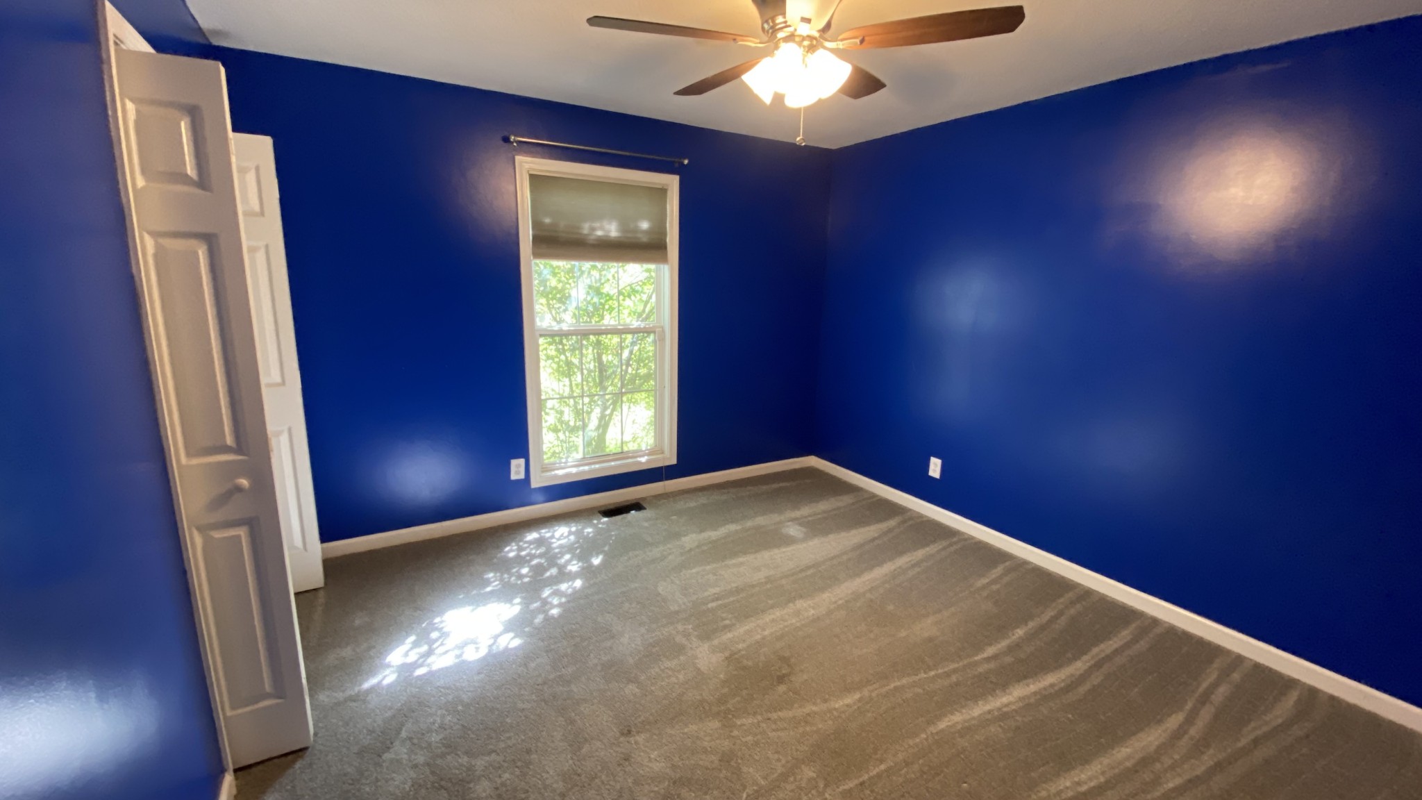 3475 Eastridge Road Woodlawn, TN 37191 - Photo 11 of 20 an empty room with windows and fan