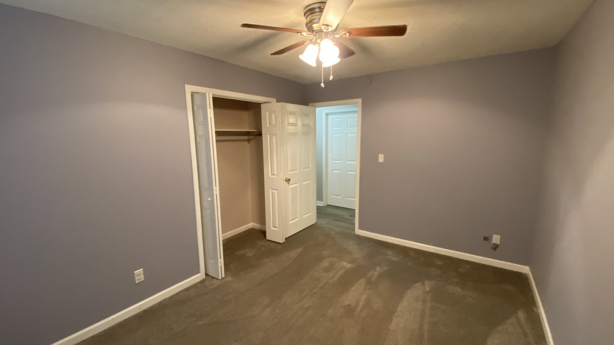 3475 Eastridge Road Woodlawn, TN 37191 - Photo 14 of 20 an empty room with closet and a chandelier fan