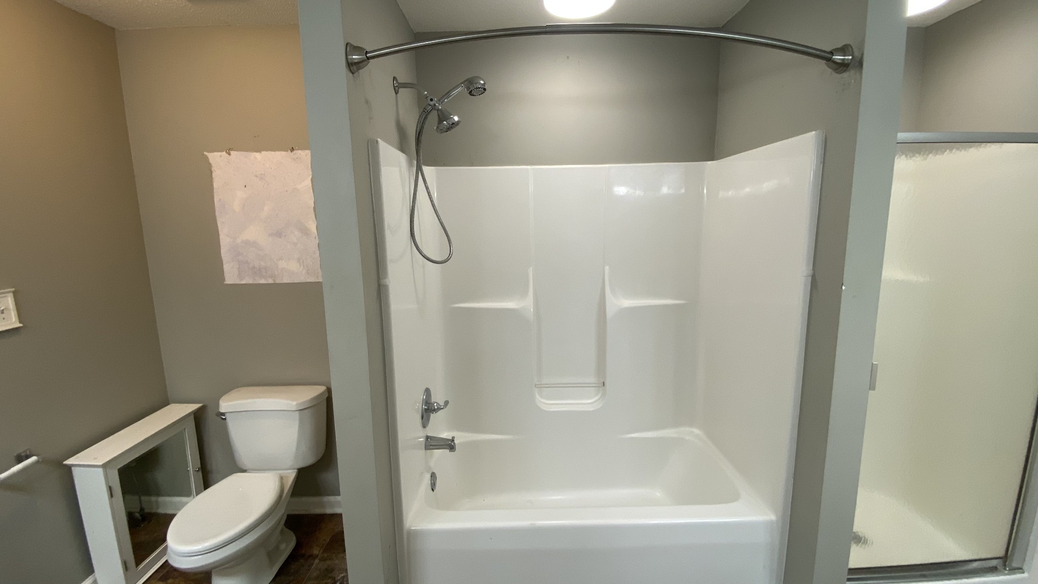 3475 Eastridge Road Woodlawn, TN 37191 - Photo 18 of 20 a bathroom with a toilet and a shower