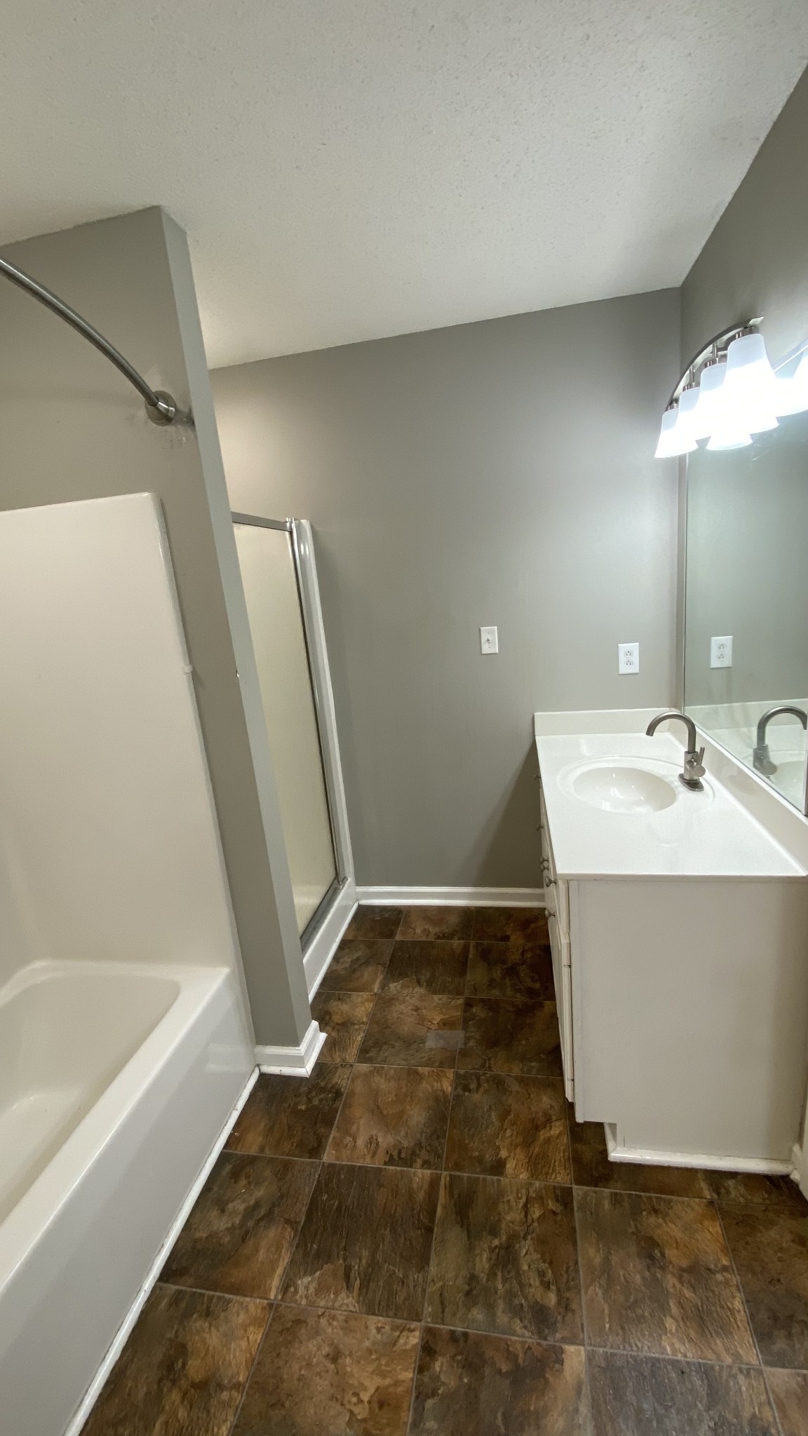 3475 Eastridge Road Woodlawn, TN 37191 - Photo 19 of 20 a bathroom with a sink a mirror and a bathtub