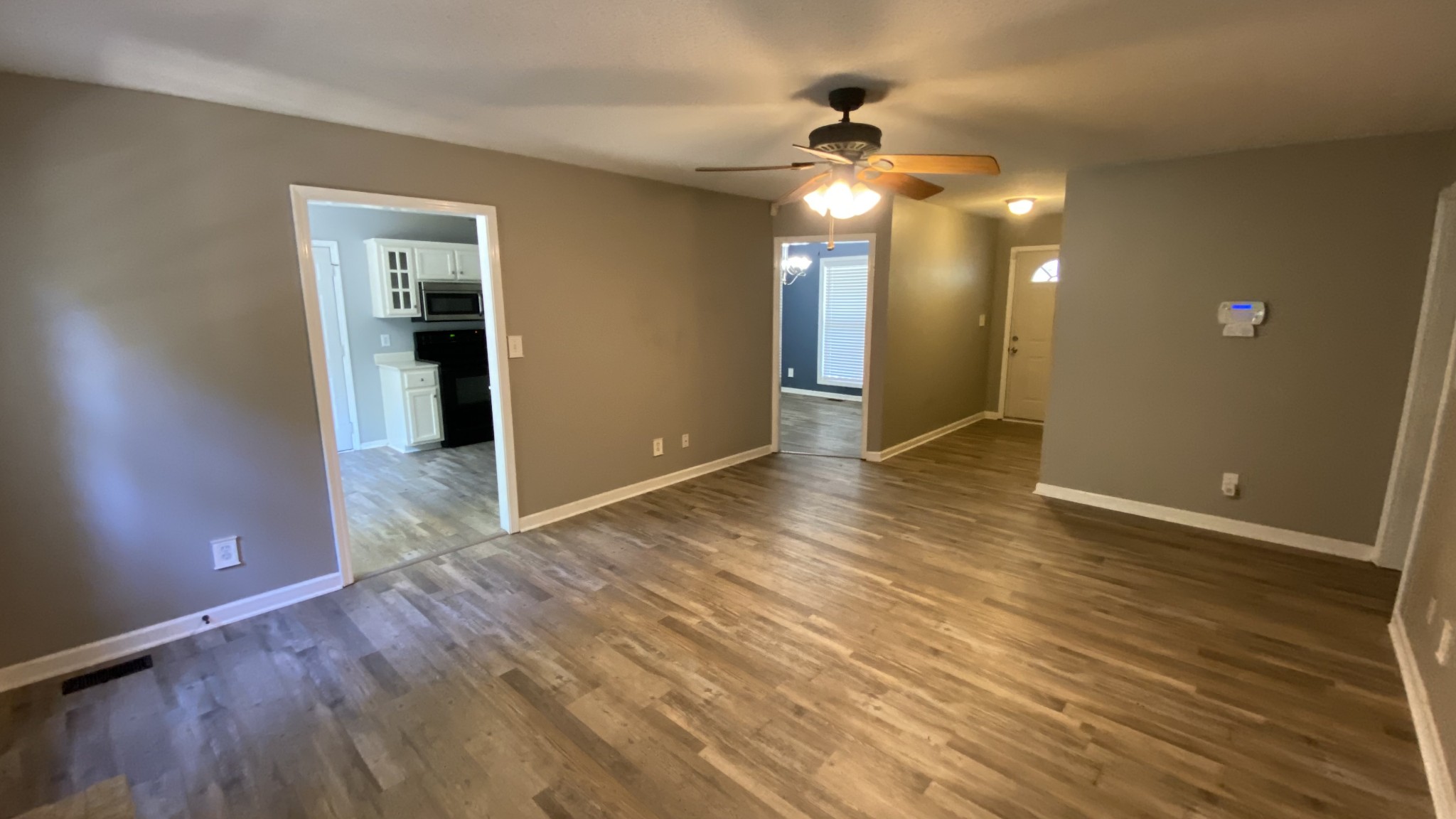 3475 Eastridge Road Woodlawn, TN 37191 - Photo 3 of 20 a view of a livingroom with a chandelier