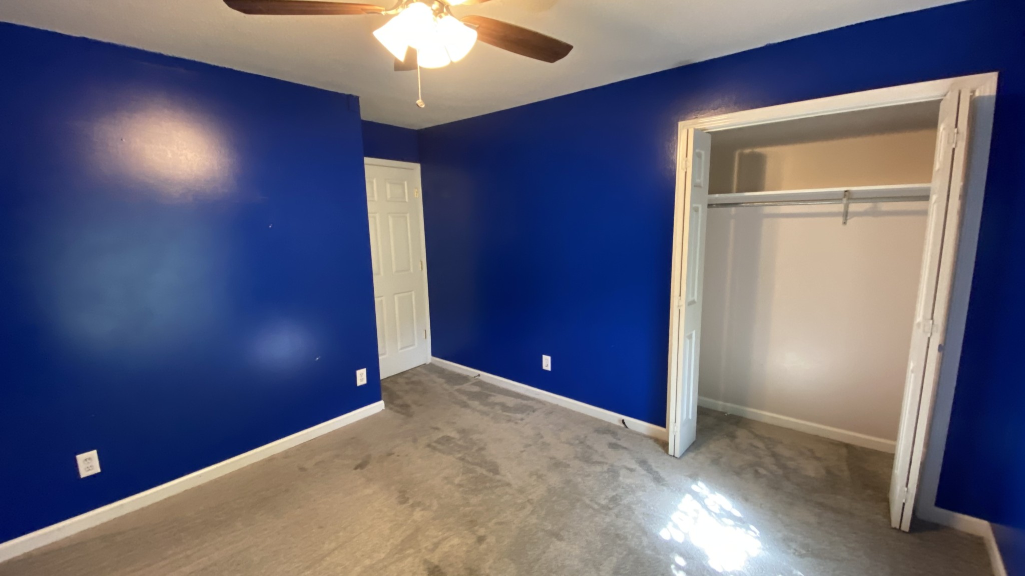 3475 Eastridge Road Woodlawn, TN 37191 - Photo 10 of 20 an empty room with closet and a chandelier fan