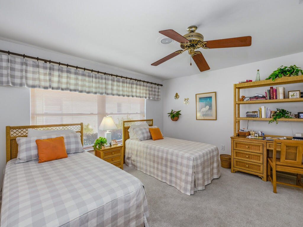 314 Torrey Pines Point Naples, FL 34113 - Photo 14 of 21 a bedroom with two beds and painted walls