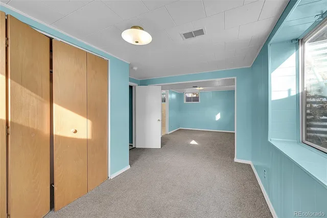 a view of gallery with windows