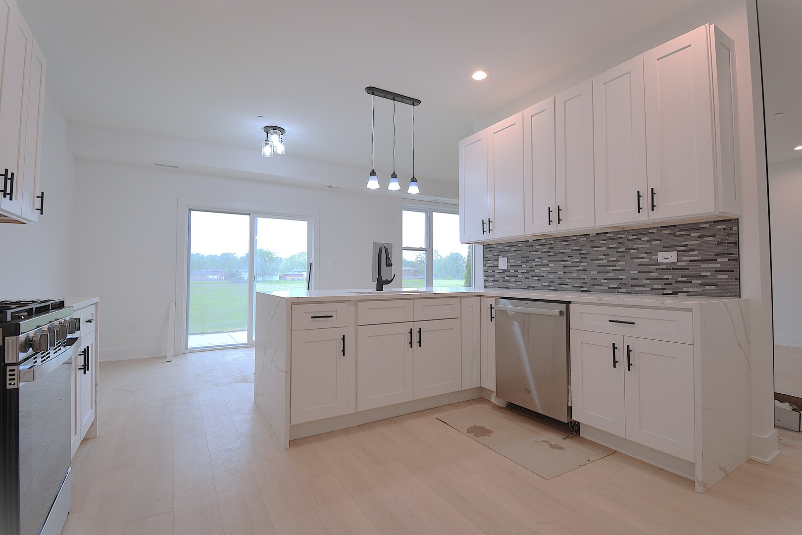 7431 Covington Place Justice, IL 60458 - Photo 11 of 23 a spacious bathroom with a granite countertop sink a mirror and a bathtub