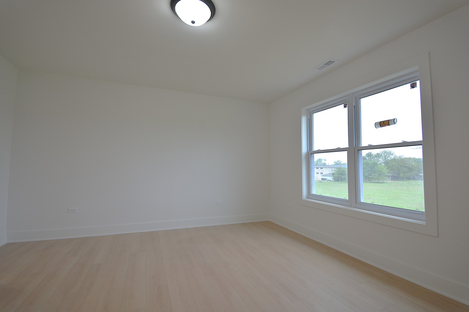 7431 Covington Place Justice, IL 60458 - Photo 13 of 23 an empty room with a window