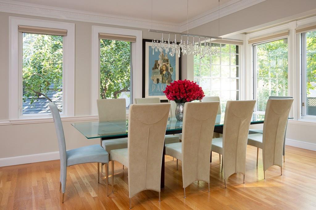 46 Griggs Road Brookline, MA 02446 - Photo 2 of 12 a view of a dining room with furniture window and wooden floor