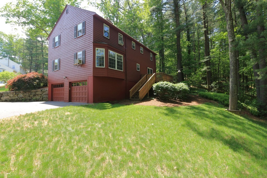 14 Meadowview Road Wayland, MA 01778 - Photo 3 of 27 a backyard of a house with lots of green space