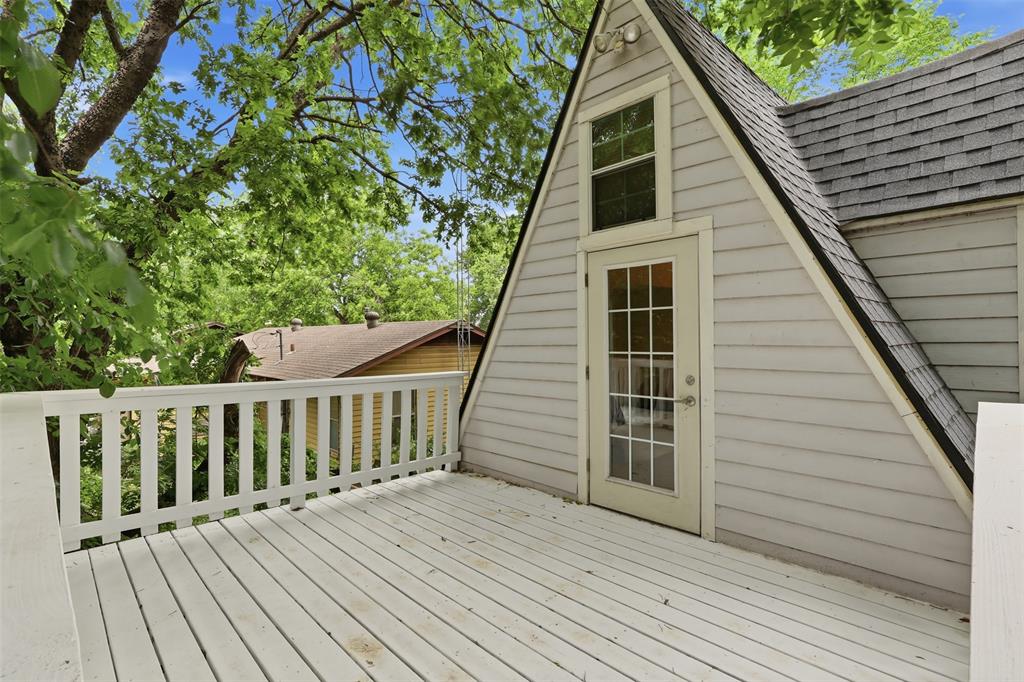 716 Lakeland Road Lake Dallas, TX 75065 - Photo 19 of 31 a view of a wooden deck