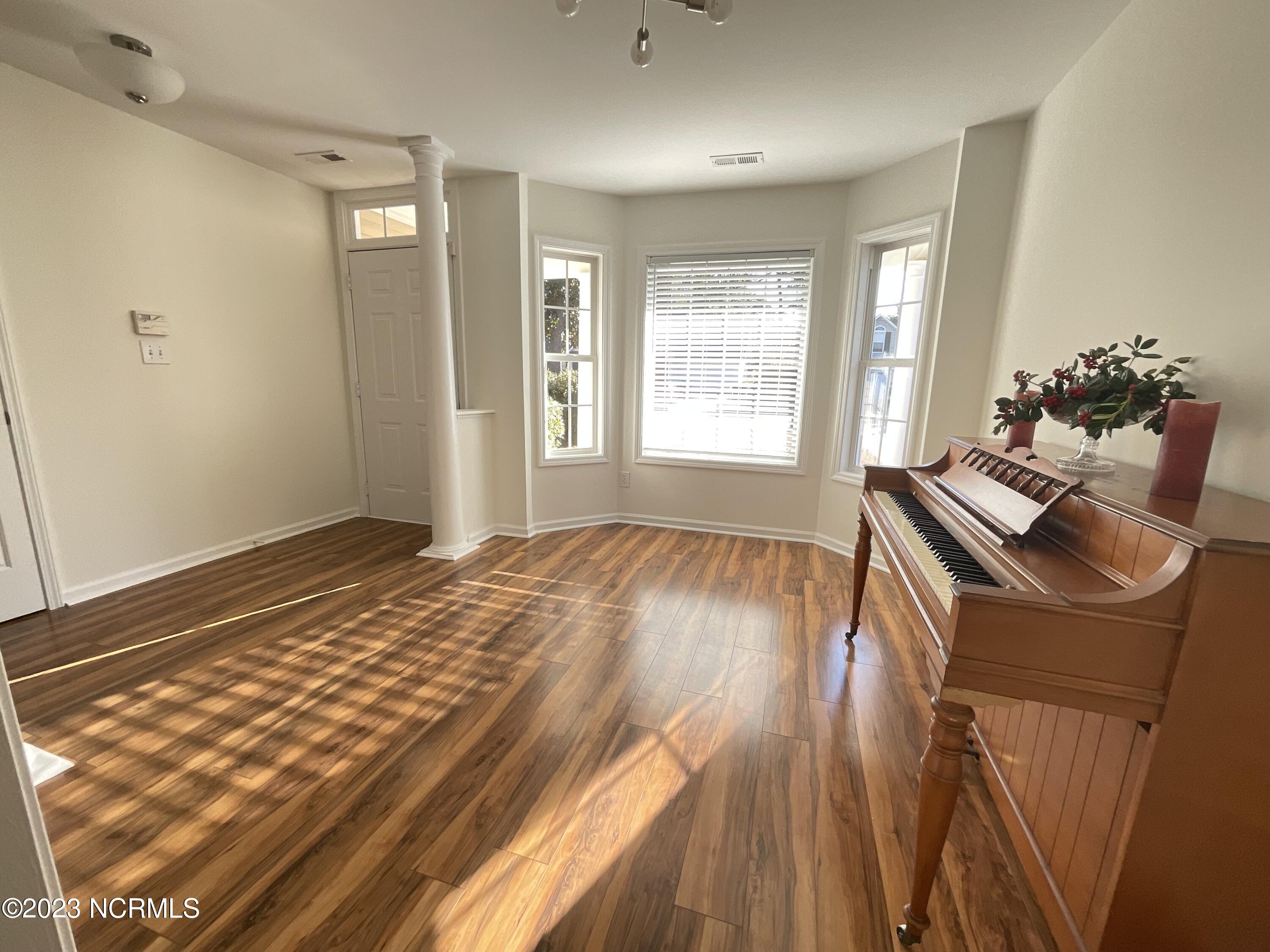 5253 Woods Edge Road Wilmington, NC 28409 - Photo 4 of 22 Front entry and music room