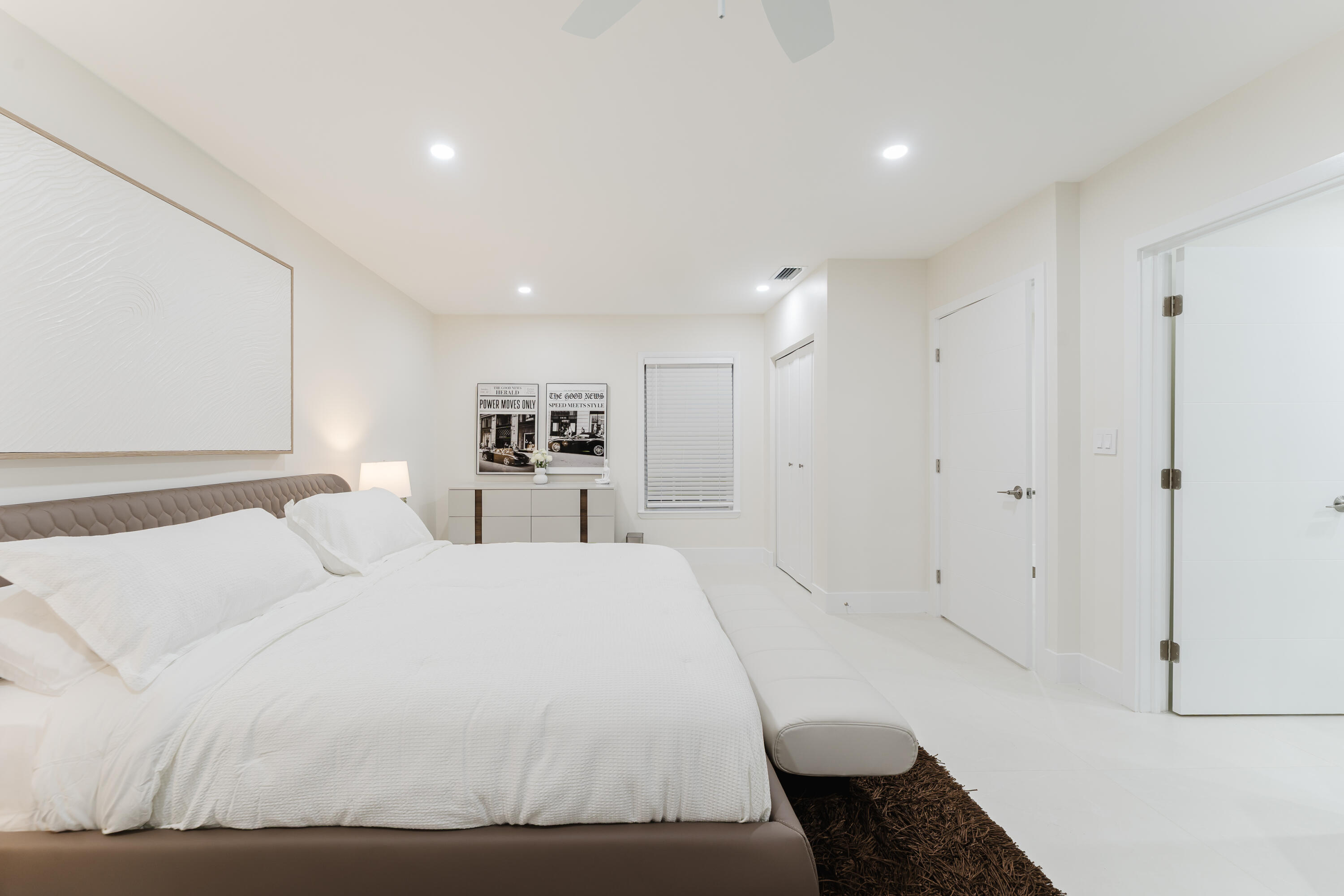 3199 Northeast 6th Drive Boca Raton, FL 33431 - Photo 27 of 49 a large white bed in a white room