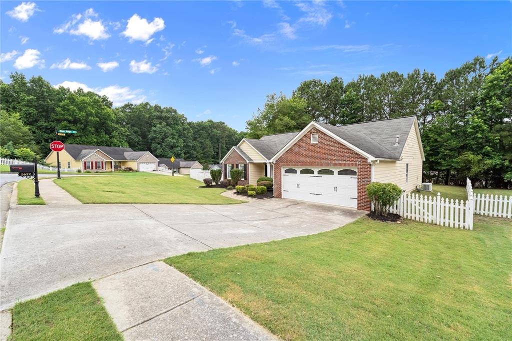 5622 Riverside Walk Drive Northeast Sugar Hill, GA 30518 - Photo 2 of 36