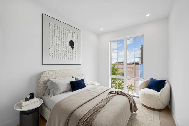 a kitchen with sink a stove and cabinets