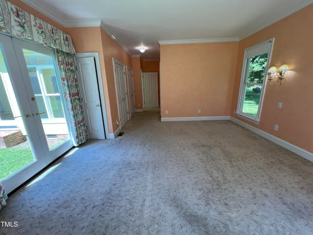 a view of livingroom with front door