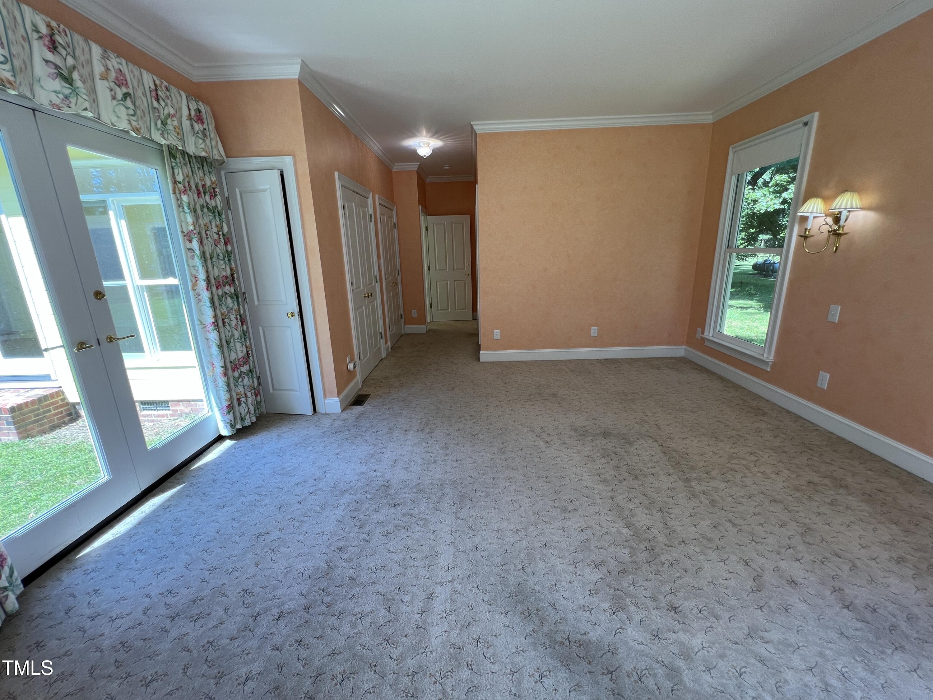 1208 Goodwin Road Apex, NC 27523 - Photo 29 of 42 a view of livingroom with front door