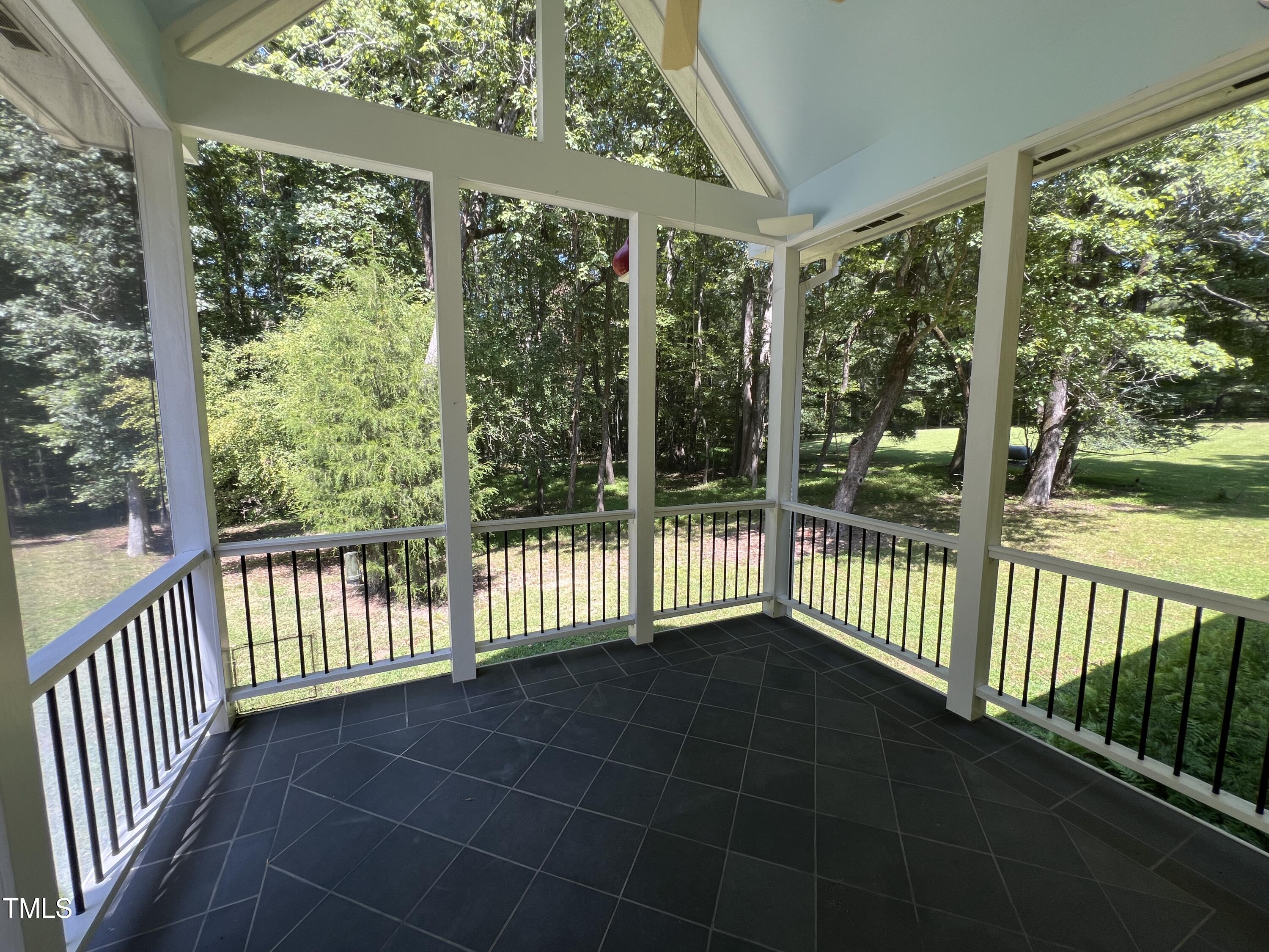 1208 Goodwin Road Apex, NC 27523 - Photo 39 of 42 a view of a porch with wooden floor